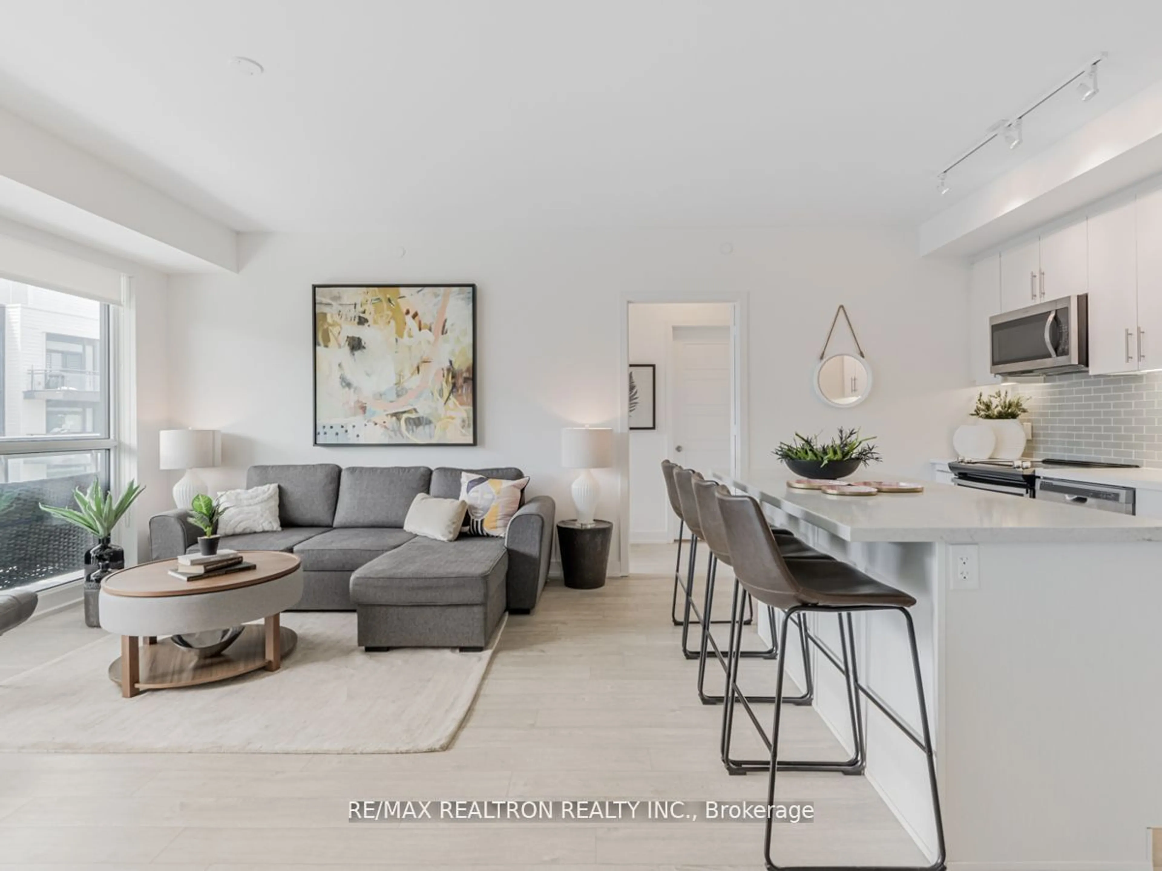 Living room with furniture, unknown for 301 Sea Ray Ave #C311, Innisfil Ontario L9S 0L8