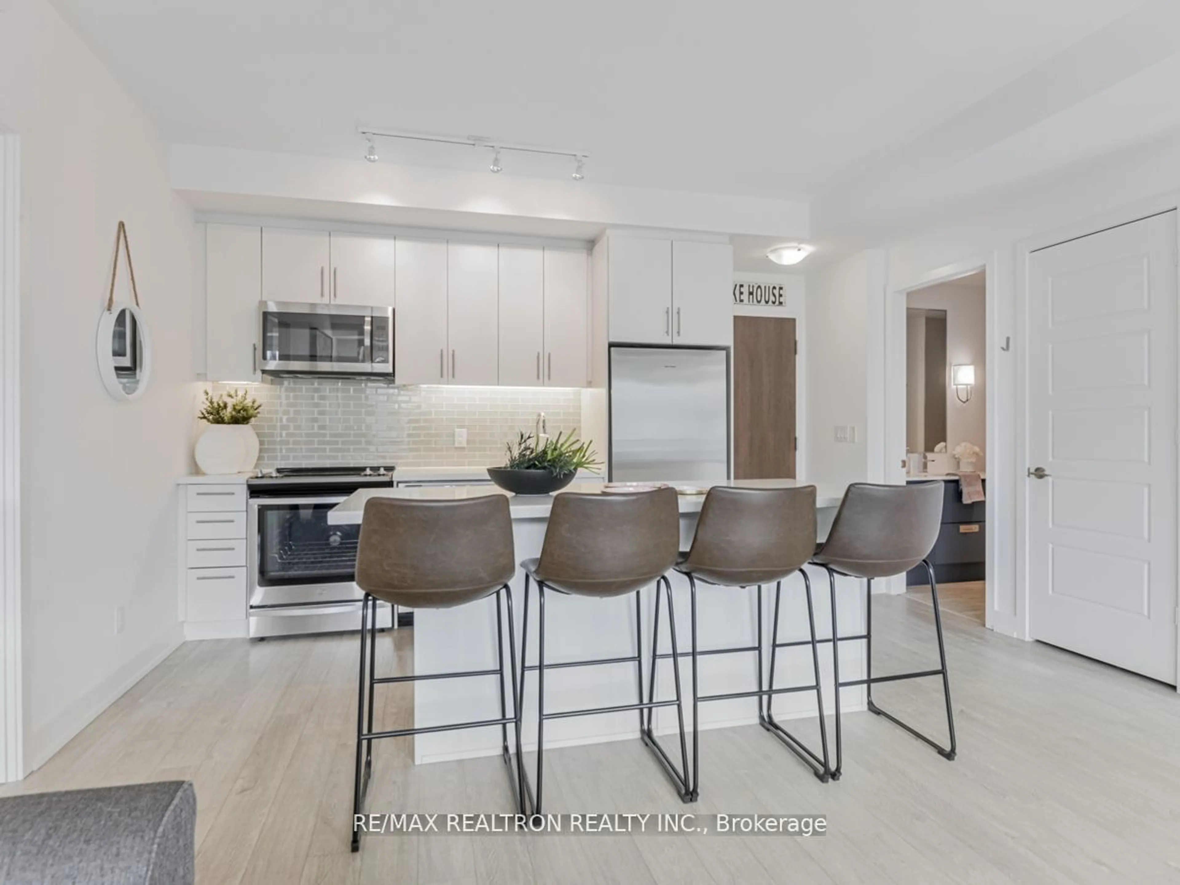 Open concept kitchen, ceramic/tile floor for 301 Sea Ray Ave #C311, Innisfil Ontario L9S 0L8