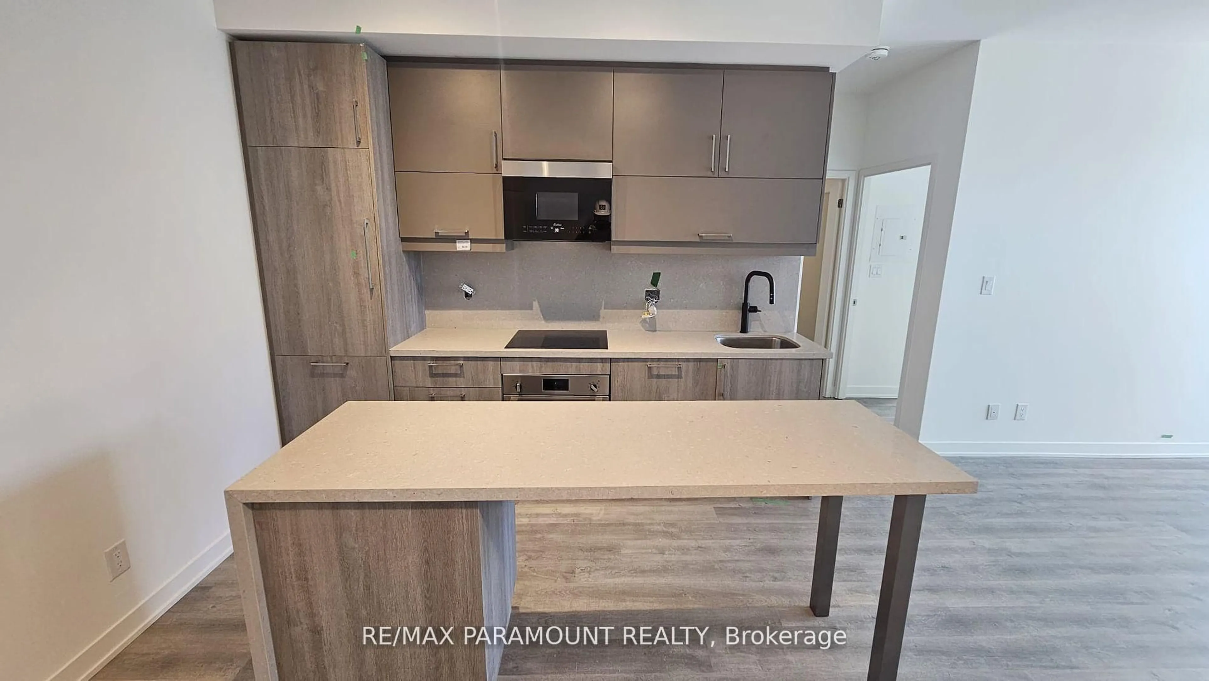 Open concept kitchen, wood/laminate floor for 8119 Birchmount Rd #1507, Markham Ontario L6G 0H5