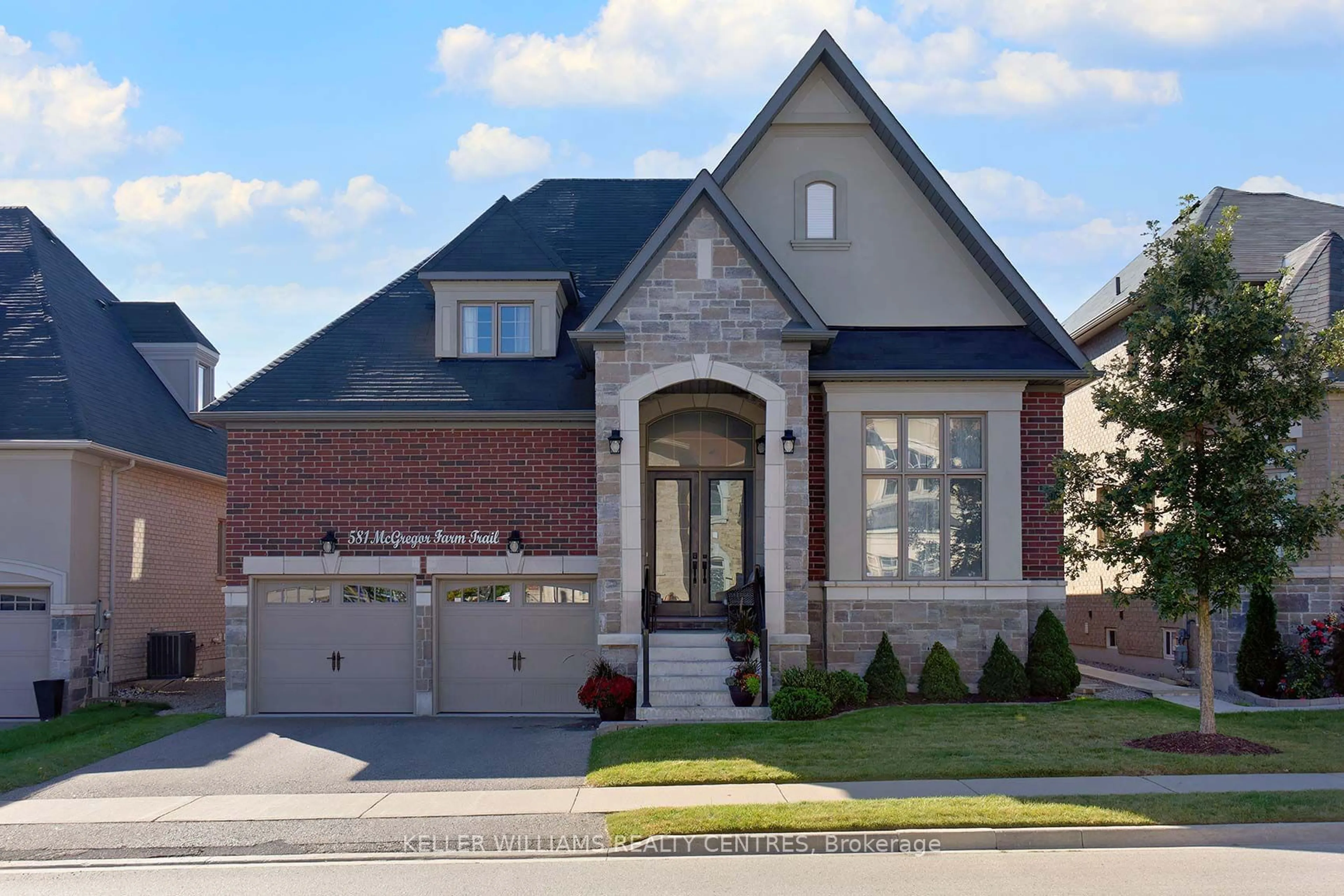 Home with brick exterior material, street for 581 McGregor Farm Tr, Newmarket Ontario L3X 0H6