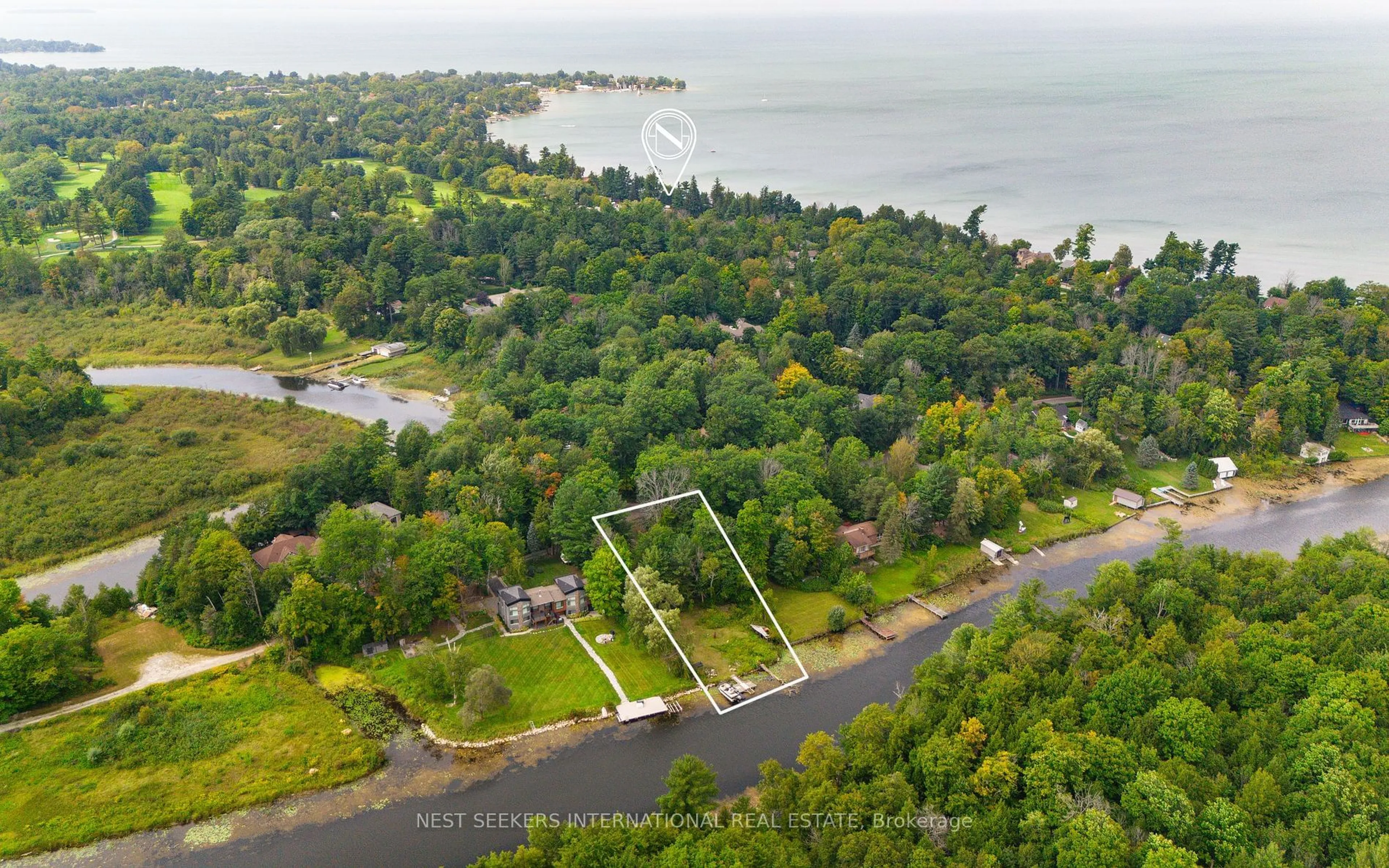 A pic from outside/outdoor area/front of a property/back of a property/a pic from drone, water/lake/river/ocean view for 87 Sibbald Cres, Georgina Ontario L0E 1R0