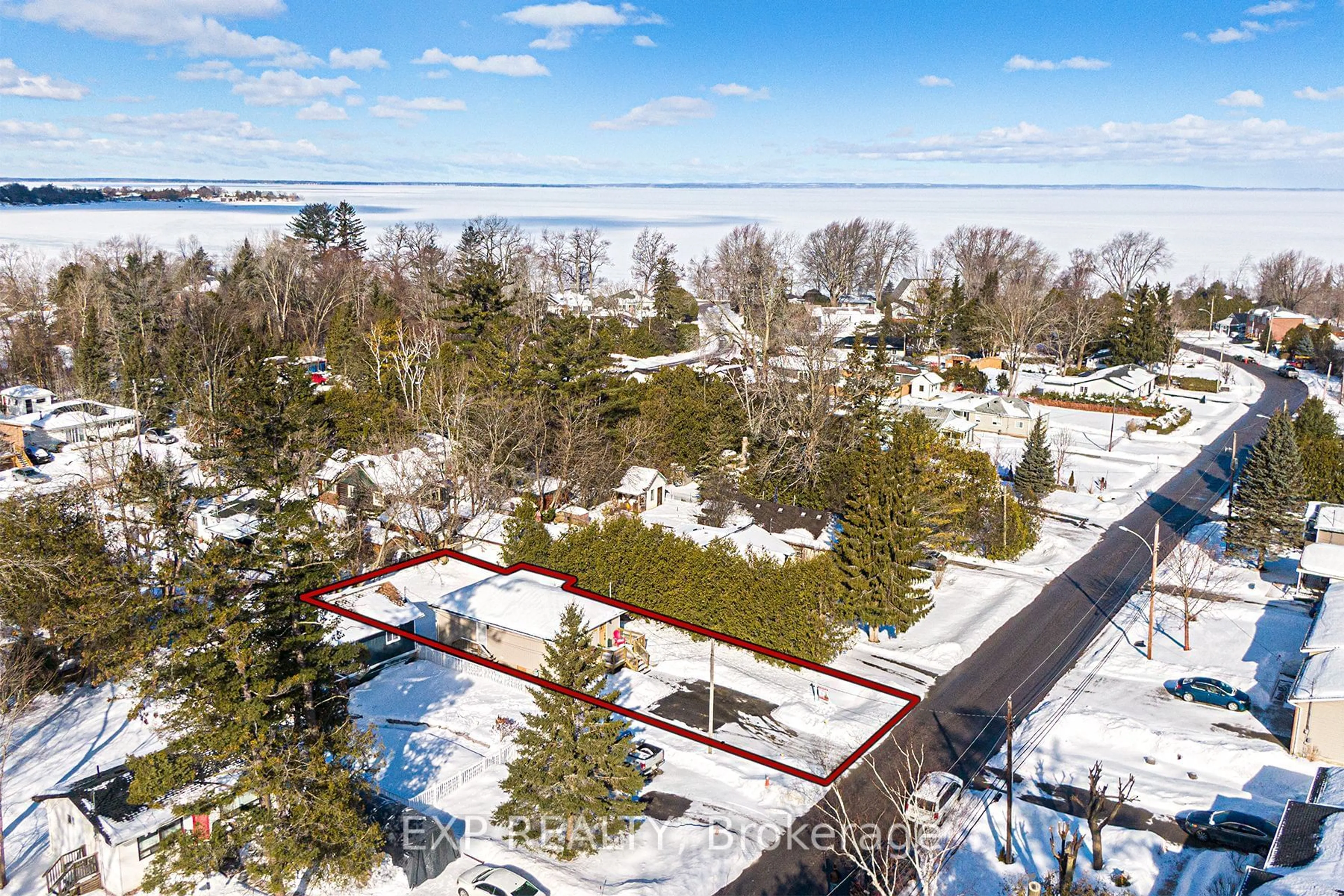 A pic from outside/outdoor area/front of a property/back of a property/a pic from drone, water/lake/river/ocean view for 102 Maple Ave, Georgina Ontario L0E 1R0