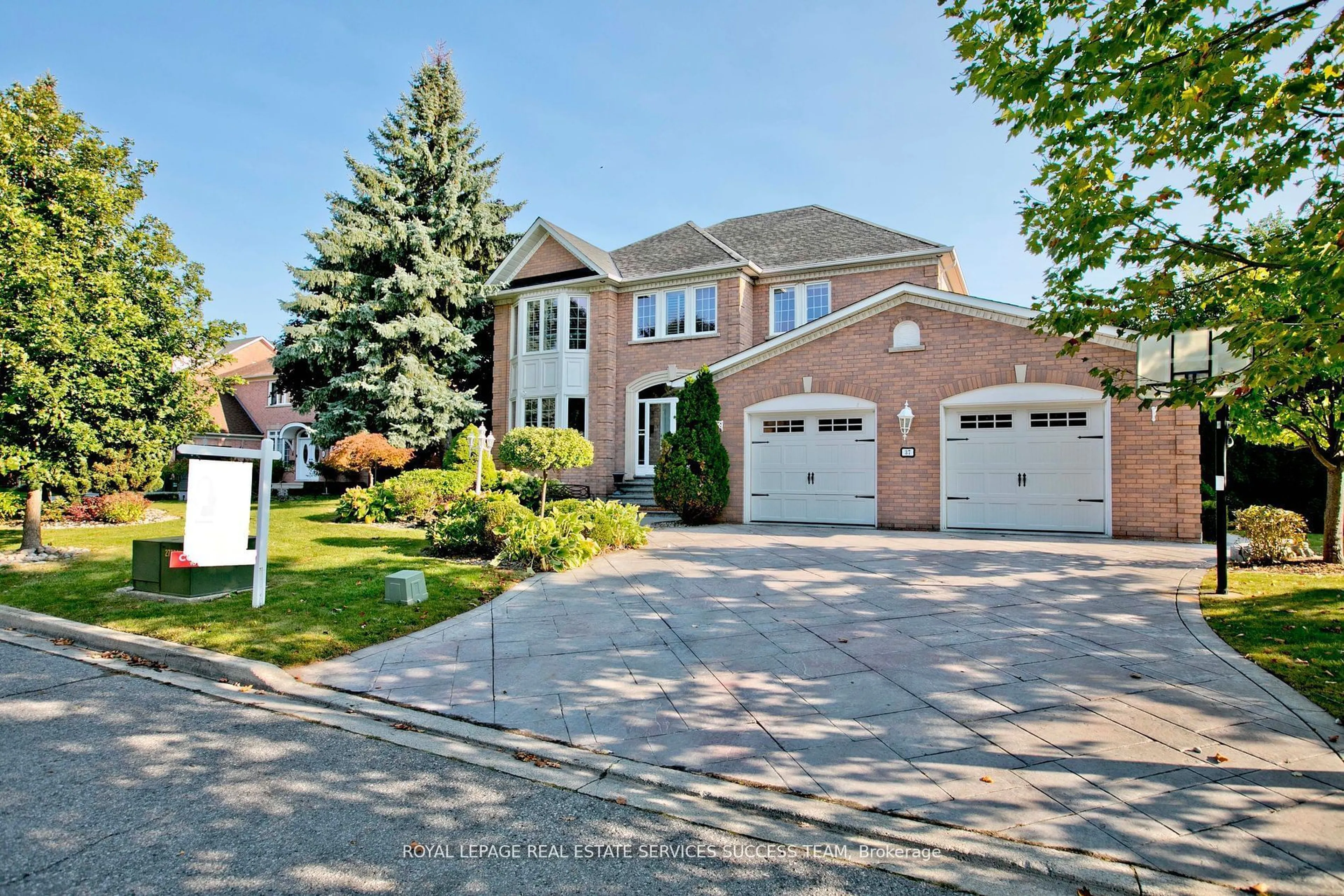 Home with brick exterior material, street for 37 Heatherwood Cres, Markham Ontario L3R 8W6