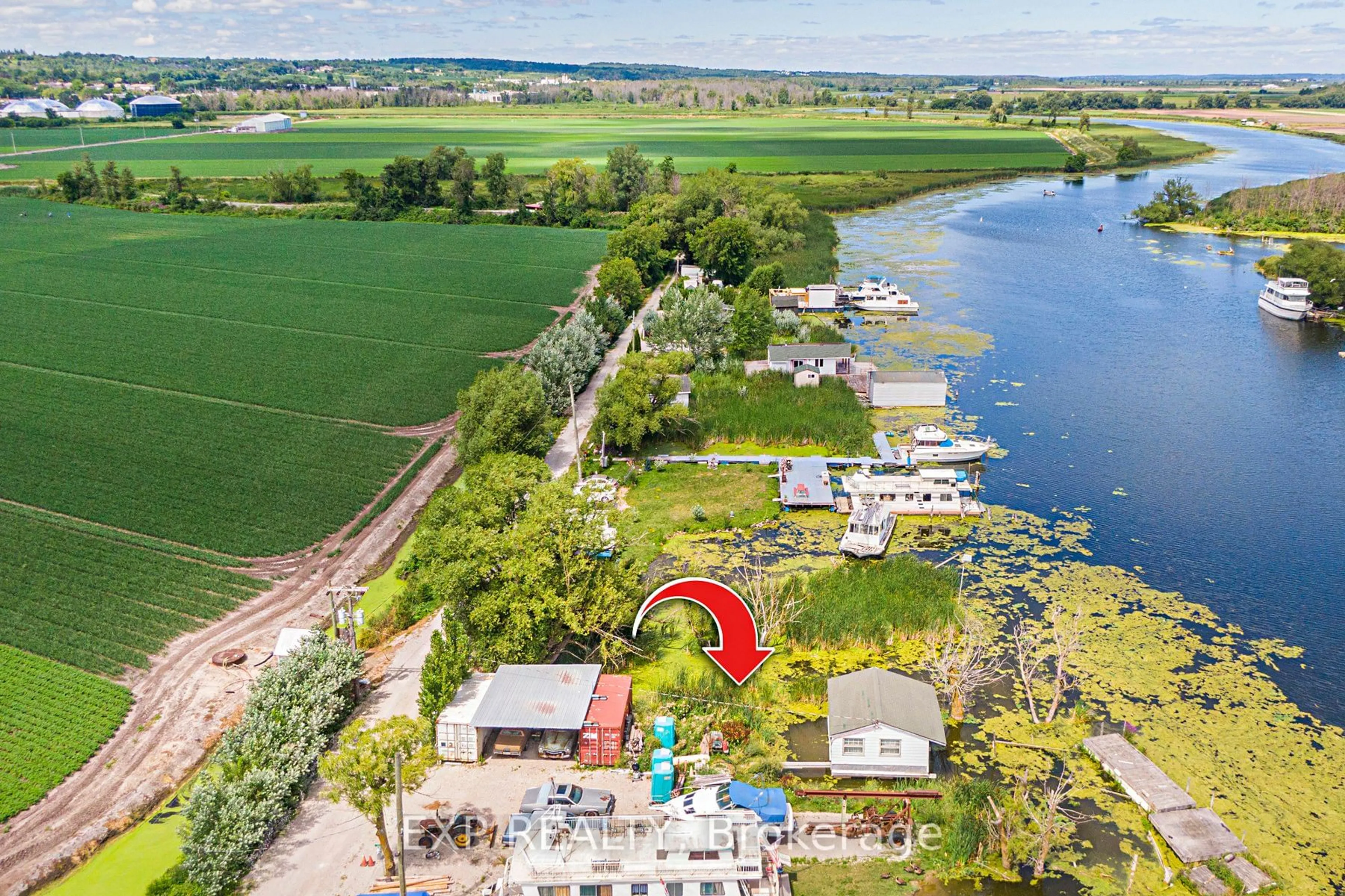 A pic from outside/outdoor area/front of a property/back of a property/a pic from drone, water/lake/river/ocean view for 17 Private Dr, Bradford West Gwillimbury Ontario L3Z 3H3