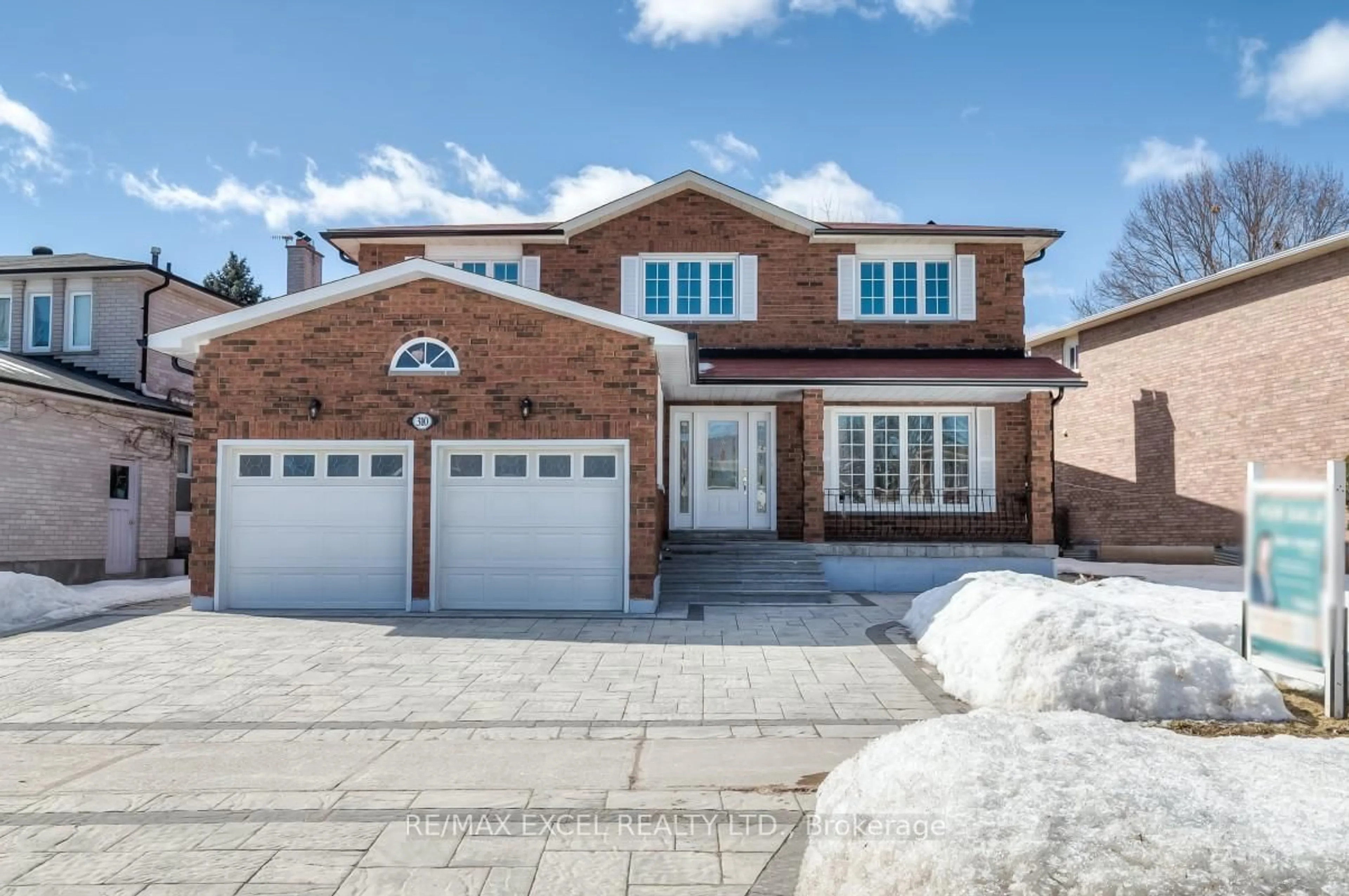 Home with brick exterior material, street for 310 Raymerville Dr, Markham Ontario L3P 6N9