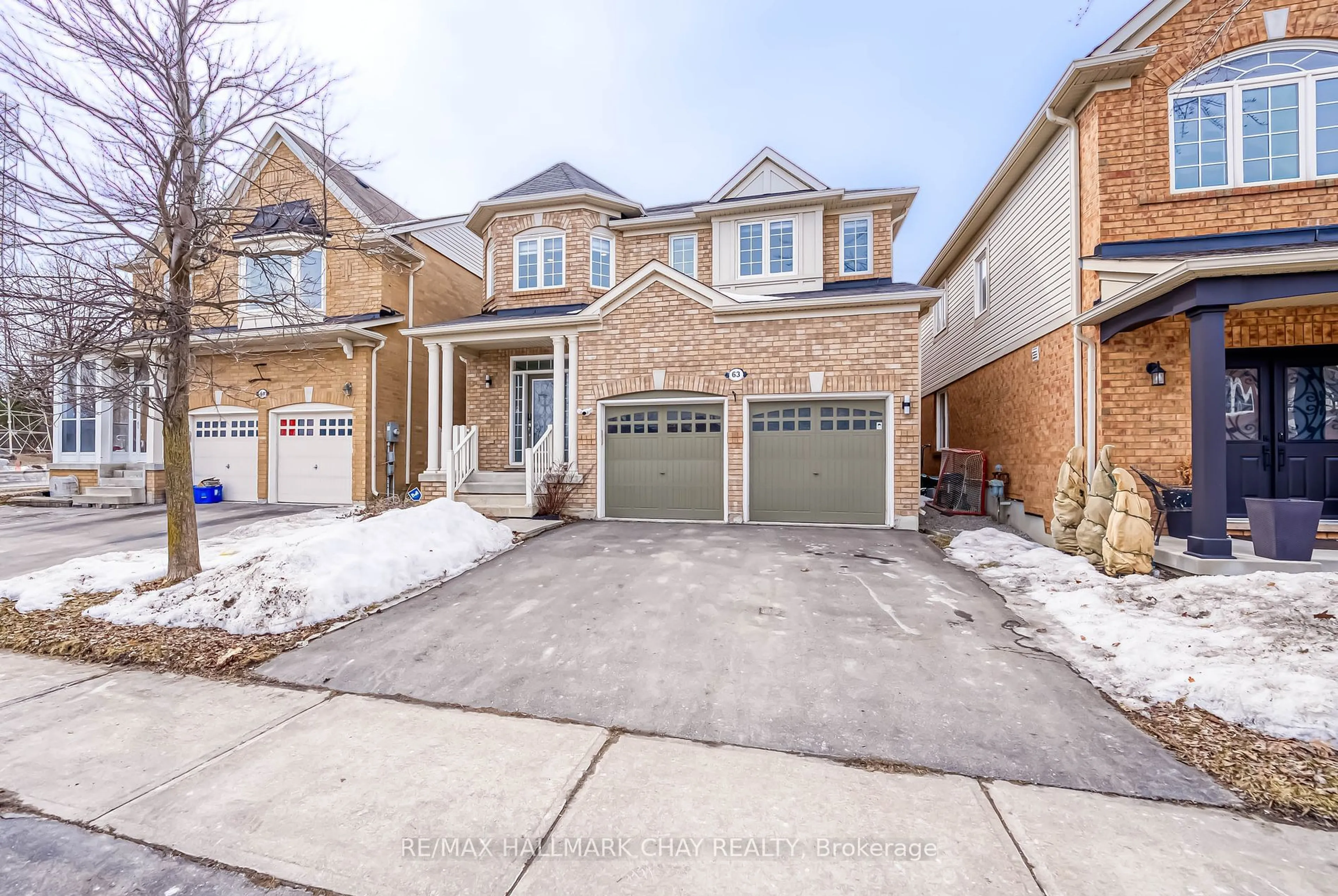 Home with brick exterior material, street for 63 Ross Patrick Cres, Newmarket Ontario L3X 3K3