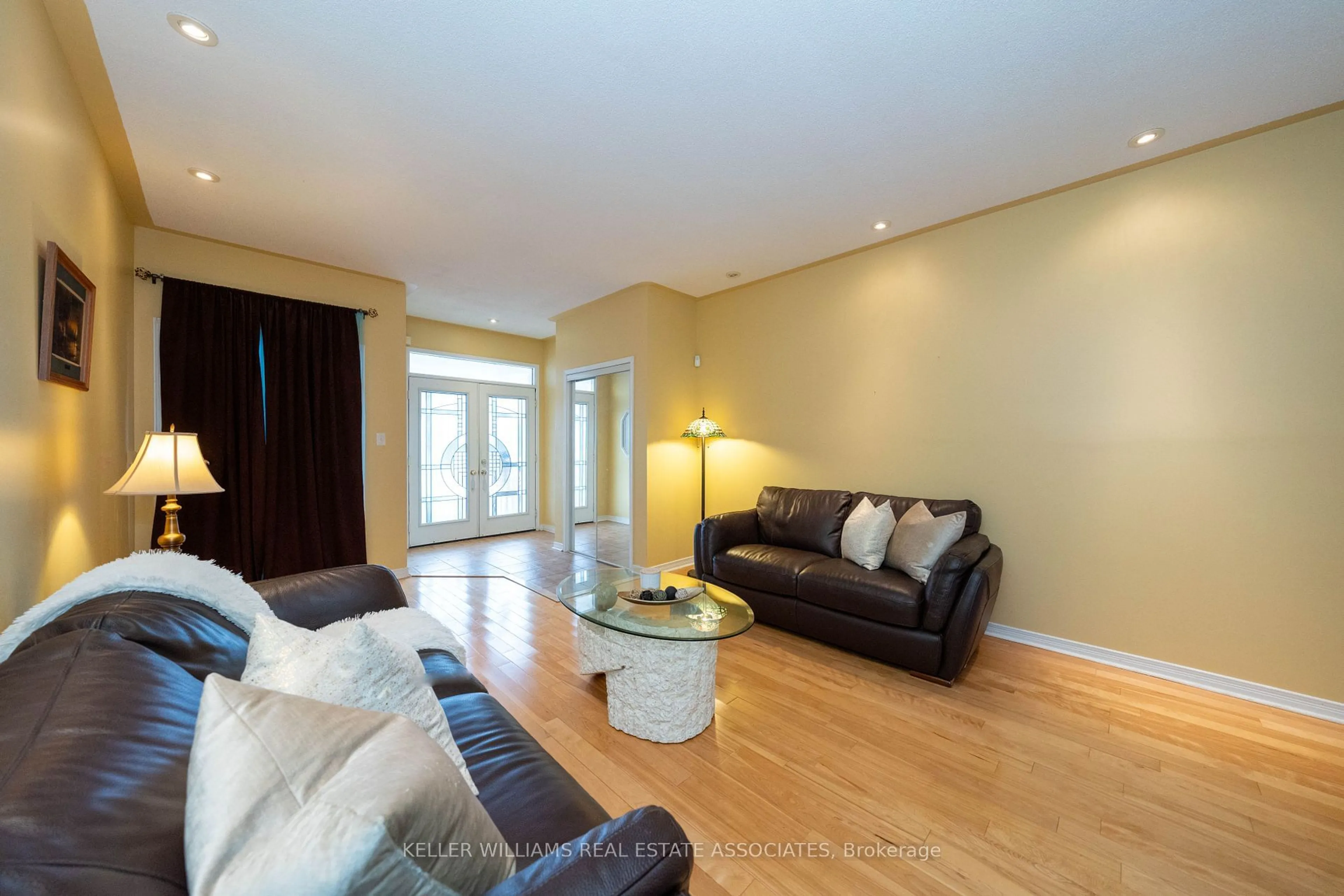 Living room with furniture, wood/laminate floor for 98 Lebovic Dr, Richmond Hill Ontario L4E 5C1