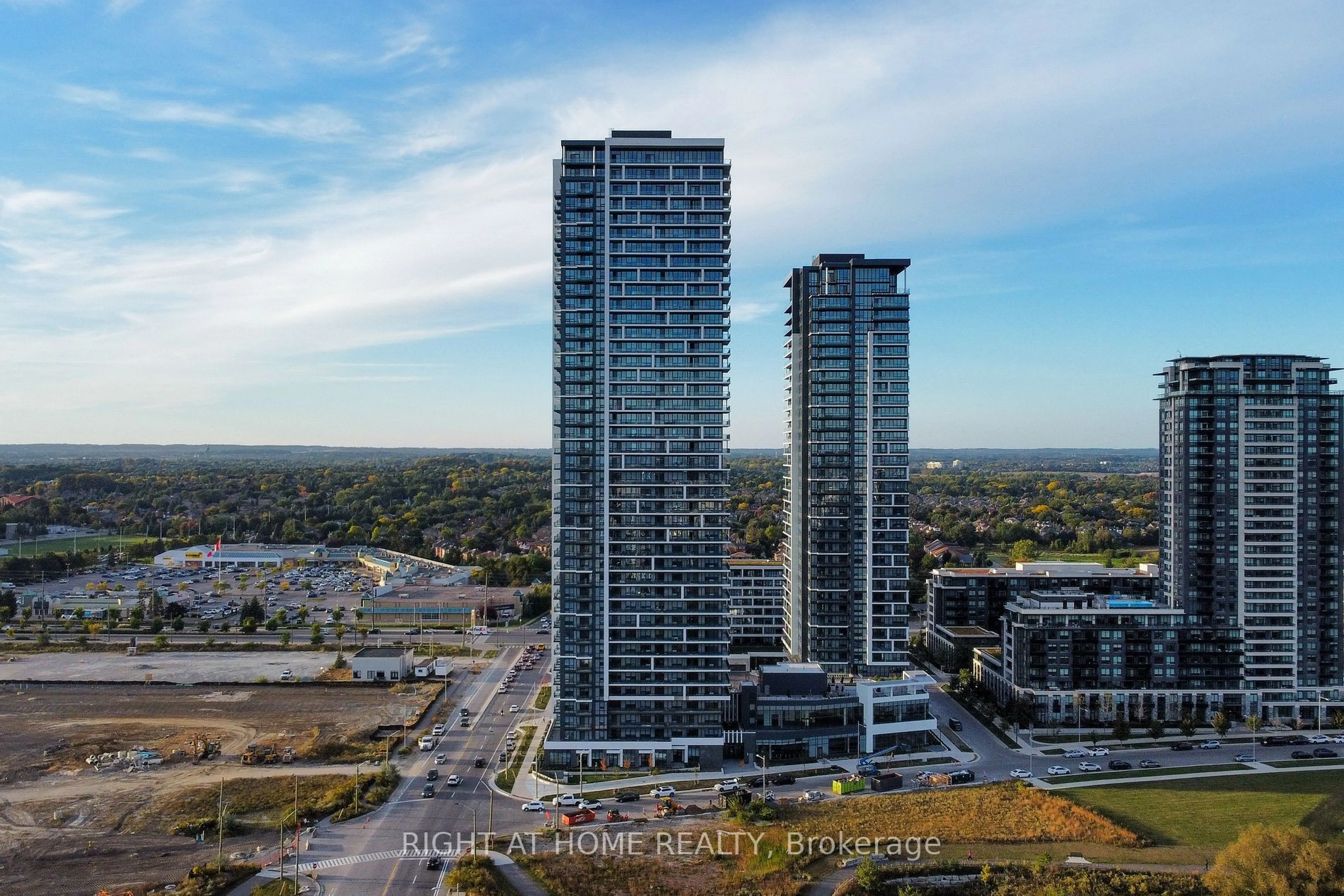 A pic from outside/outdoor area/front of a property/back of a property/a pic from drone, city buildings view from balcony for 8 Water Walk Dr #4007, Markham Ontario L3R 6L4