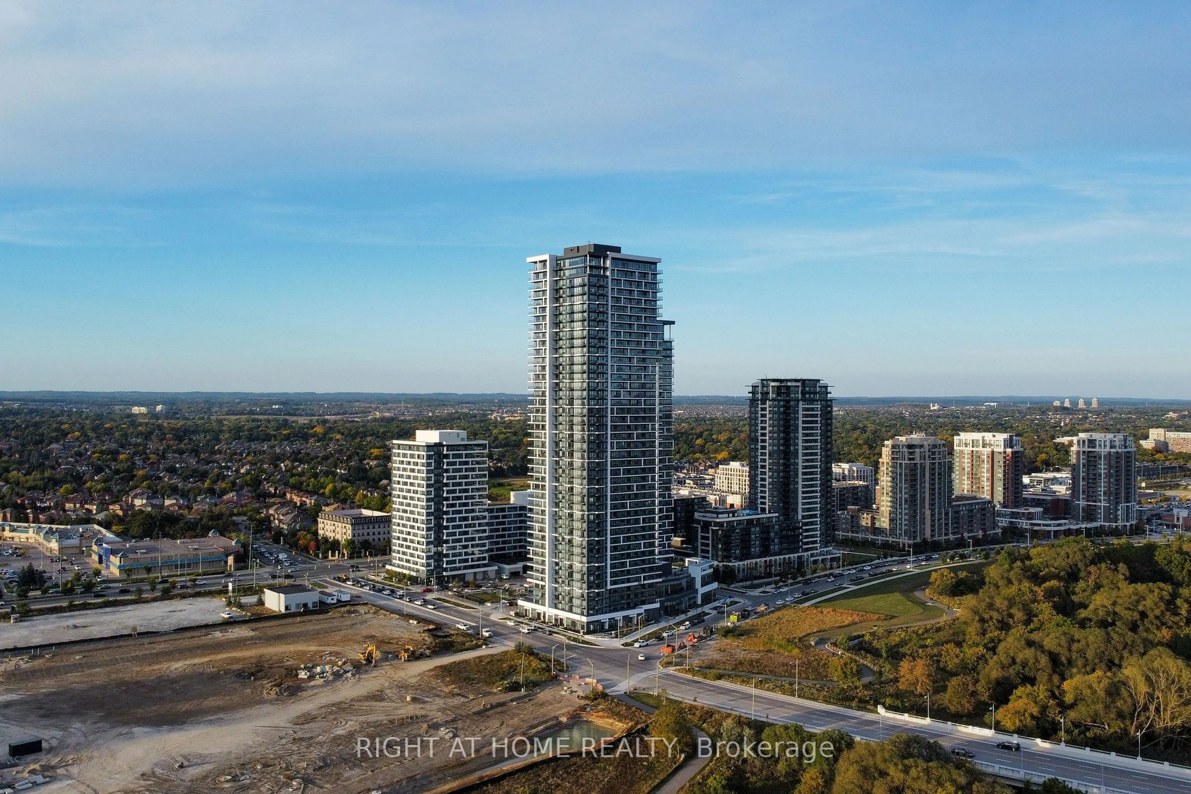 A pic from outside/outdoor area/front of a property/back of a property/a pic from drone, city buildings view from balcony for 8 Water Walk Dr #4007, Markham Ontario L3R 6L4