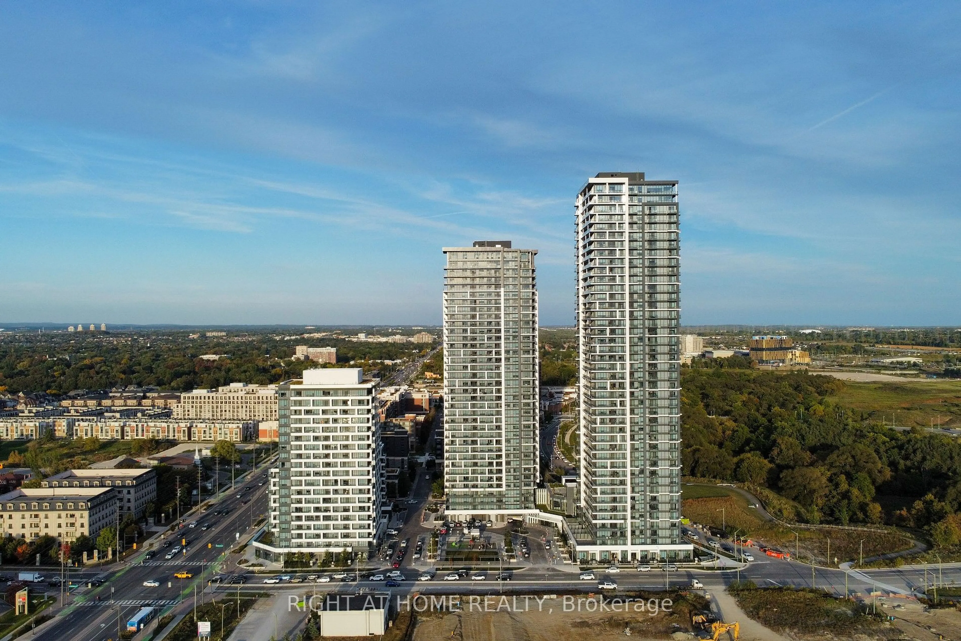 A pic from outside/outdoor area/front of a property/back of a property/a pic from drone, city buildings view from balcony for 8 Water Walk Dr #4007, Markham Ontario L3R 6L4