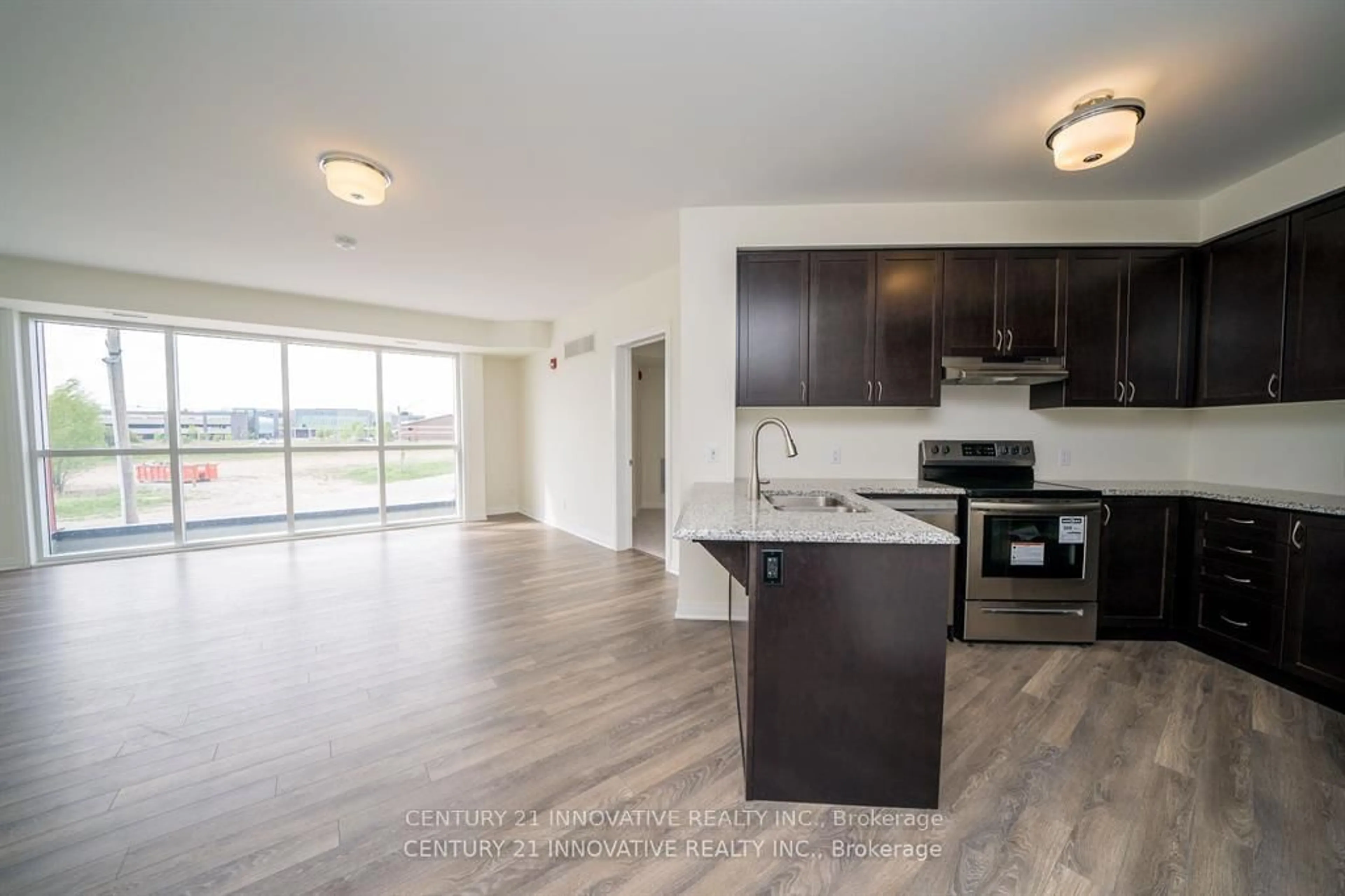 Open concept kitchen, unknown for 58 Adam Sellers St #212, Markham Ontario L6B 1M7