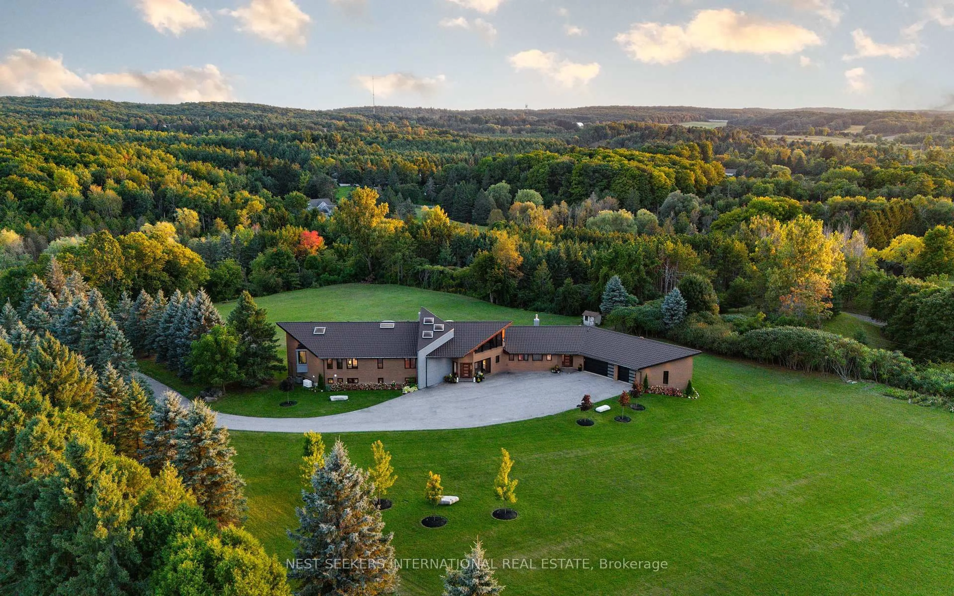 A pic from outside/outdoor area/front of a property/back of a property/a pic from drone, mountain view for 2510 17th Sideroad N/A, King Ontario L7B 1A3