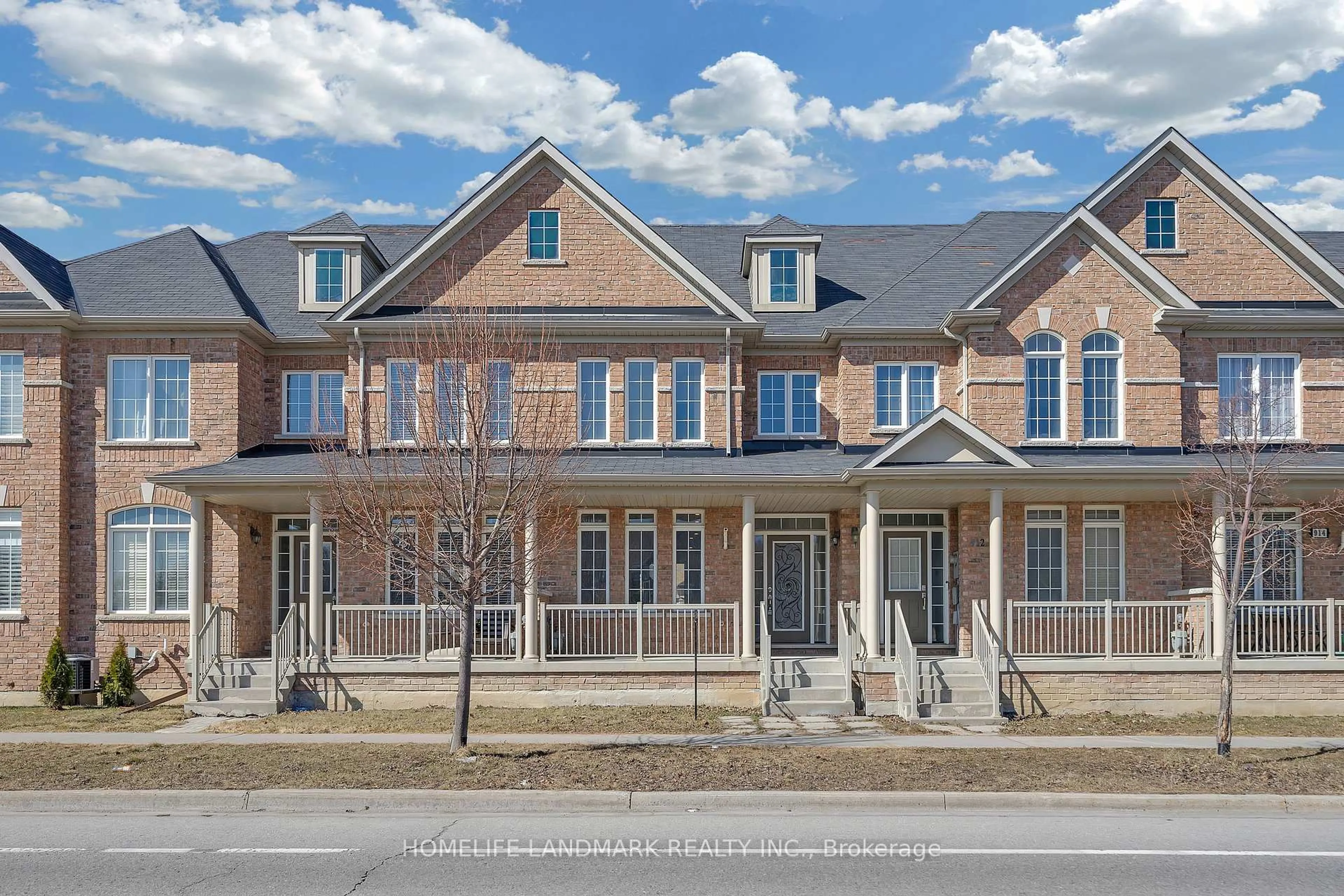 Home with brick exterior material, street for 910 Castlemore Ave, Markham Ontario L6E 0P5