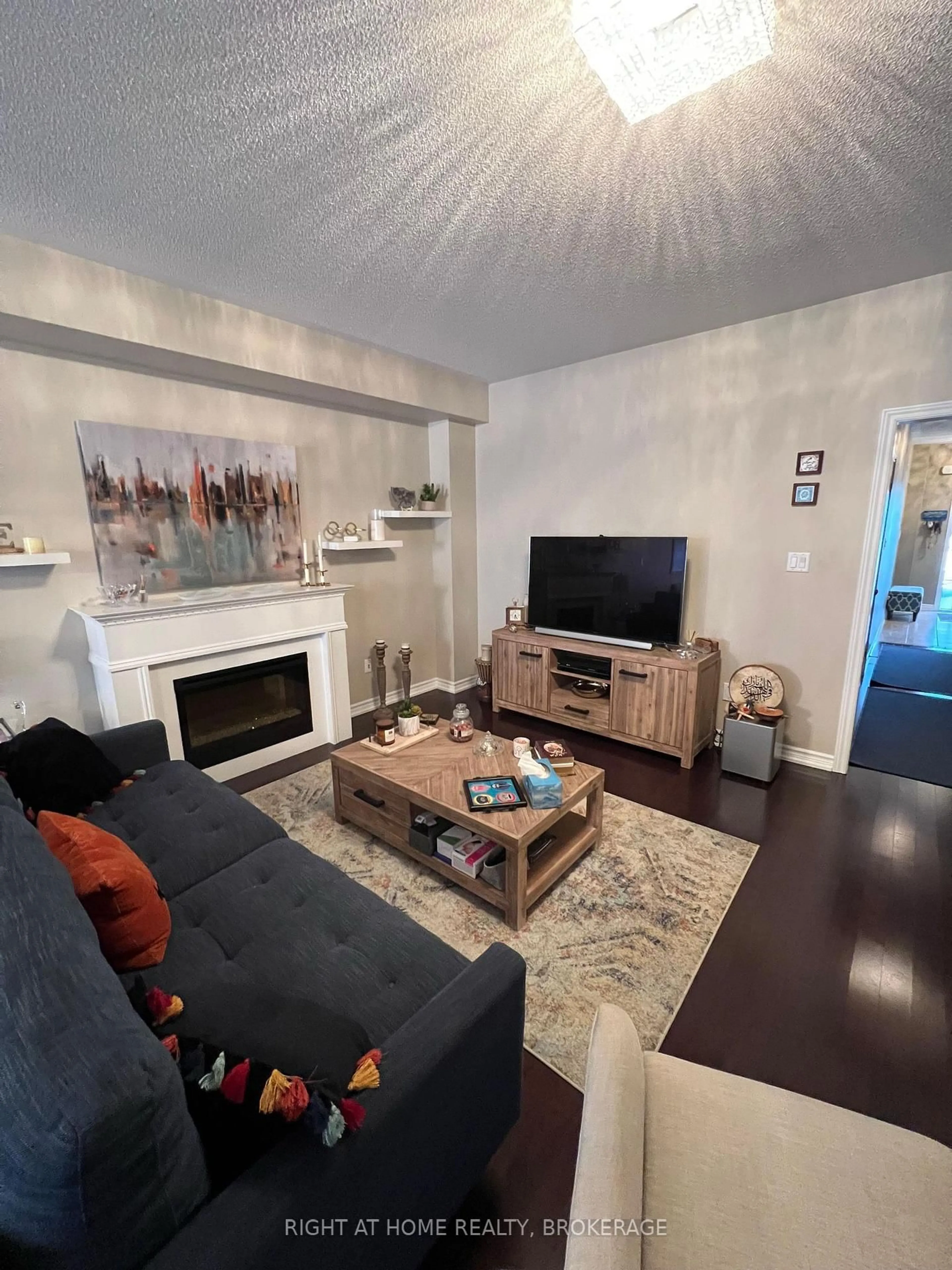 Living room with furniture, wood/laminate floor for 60 Zachary Pl, Vaughan Ontario L4H 3S4