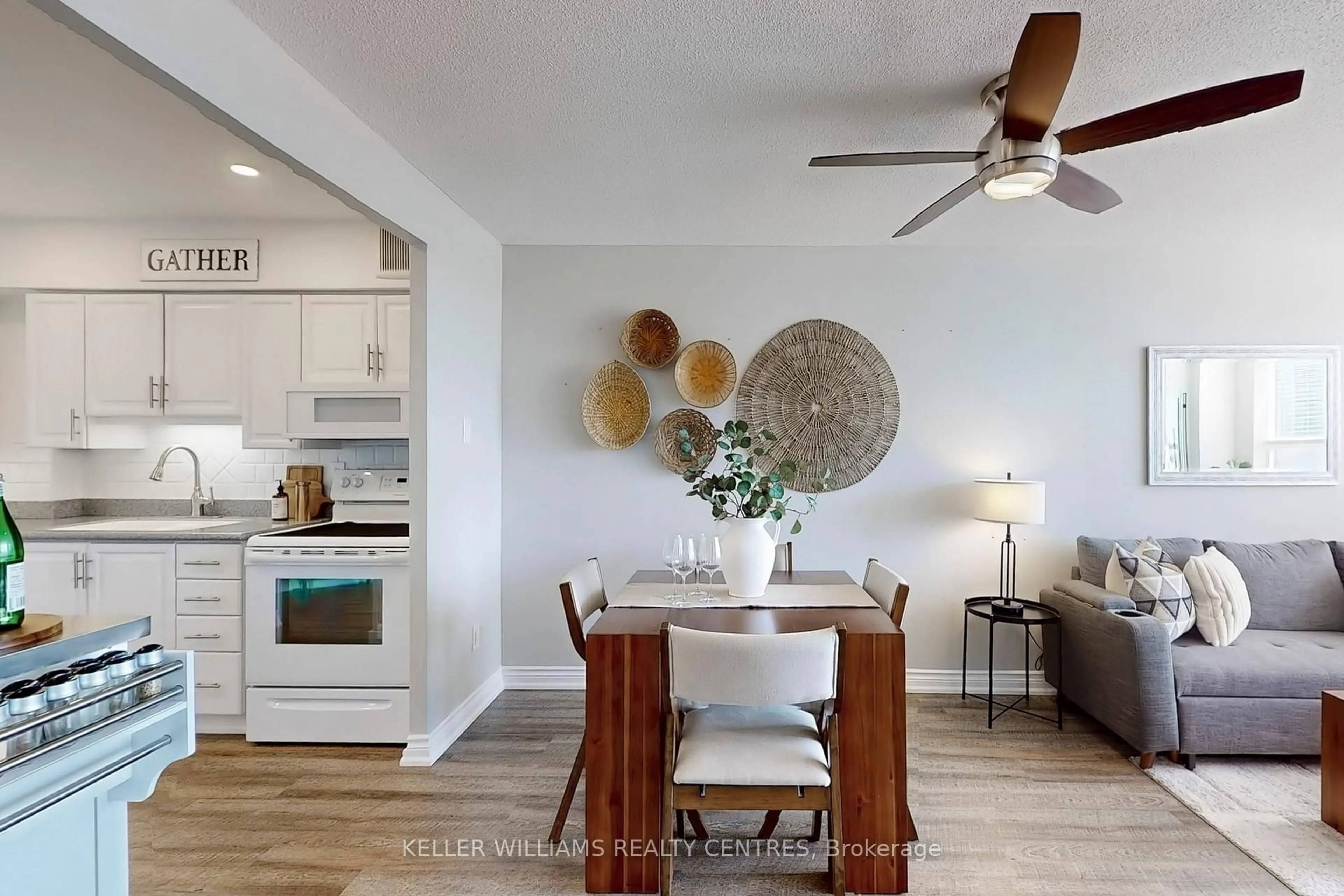 Open concept kitchen, wood/laminate floor for 250 Davis Dr #1003, Newmarket Ontario L3Y 7T7