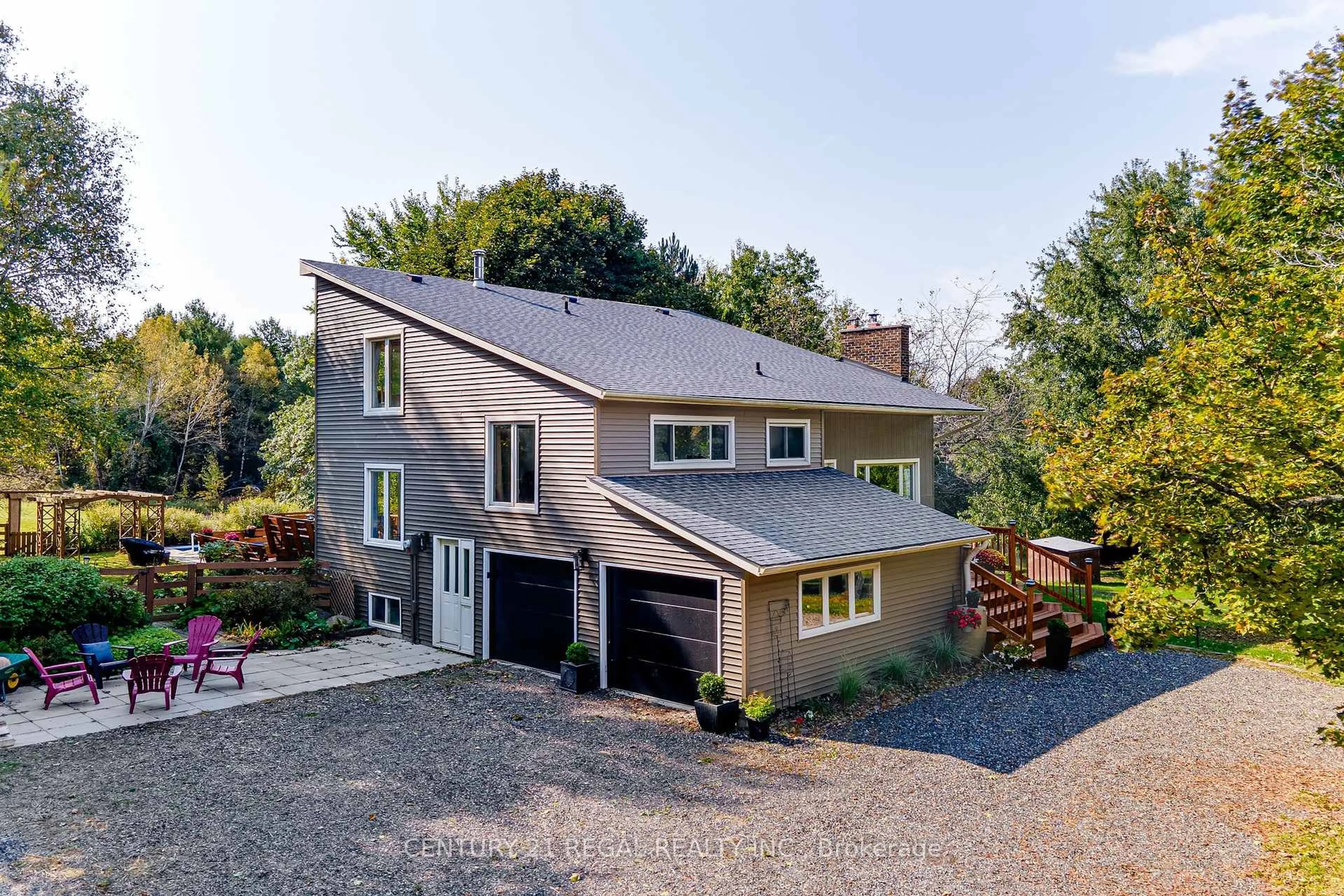 A pic from outside/outdoor area/front of a property/back of a property/a pic from drone, street for 6171 7th Line, New Tecumseth Ontario L0G 1A0