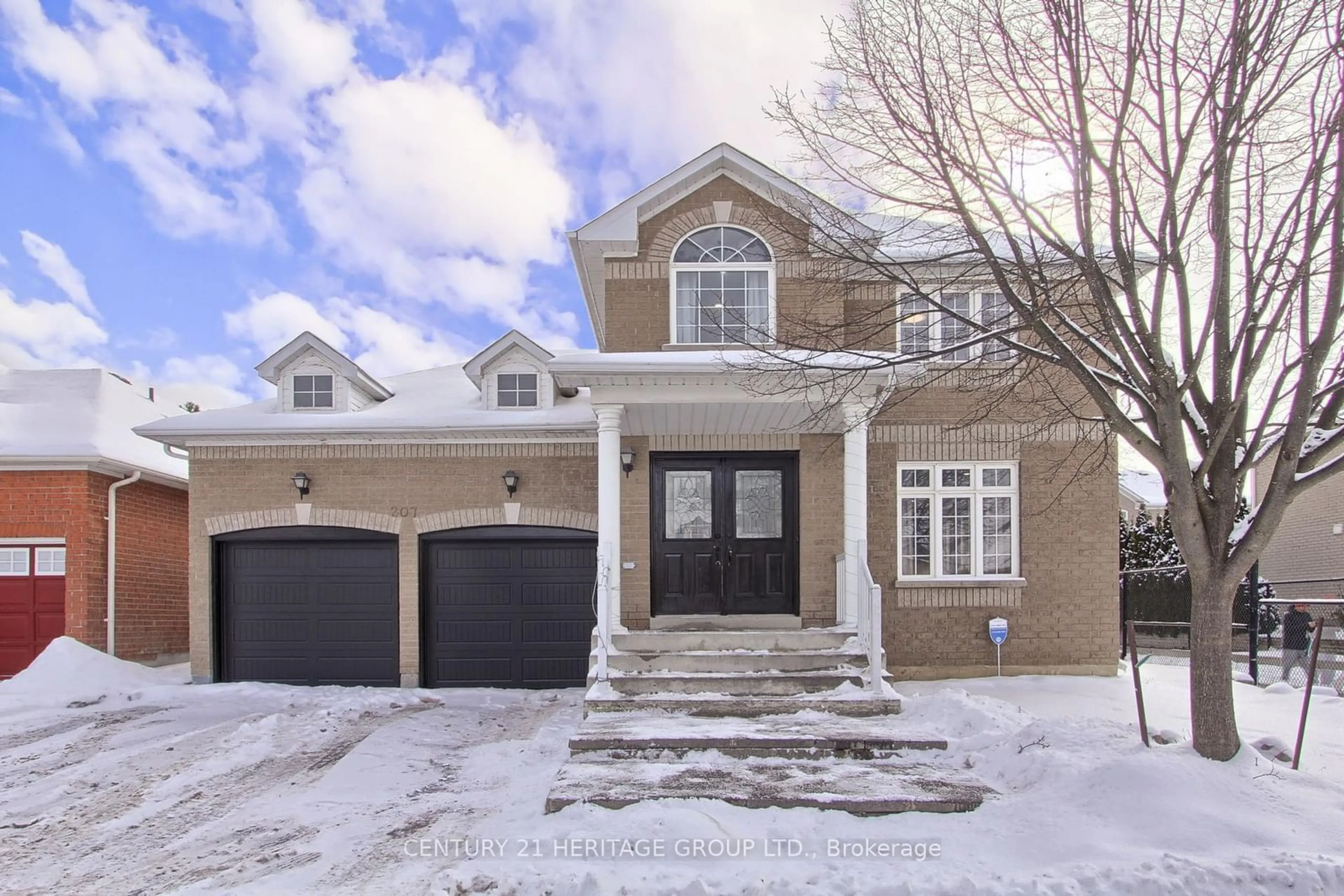 Home with brick exterior material, street for 207 Flagstone Way, Newmarket Ontario L3X 2Y3
