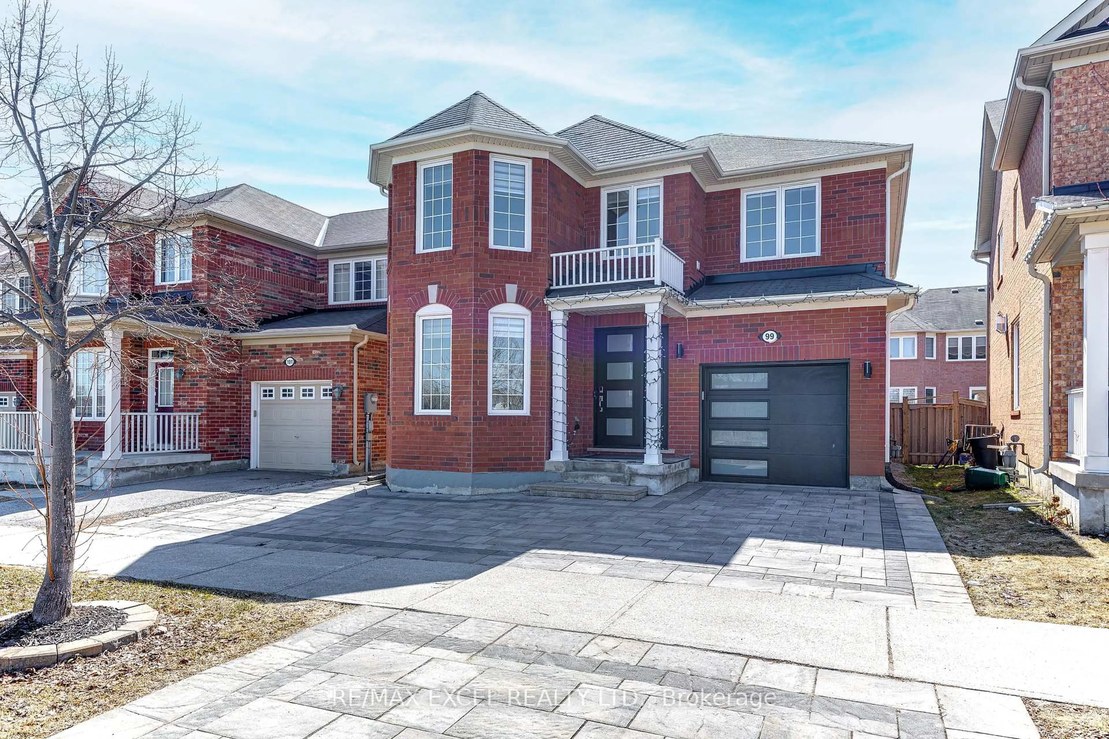 Home with brick exterior material, street for 99 James Parrott Ave, Markham Ontario L6E 2B3