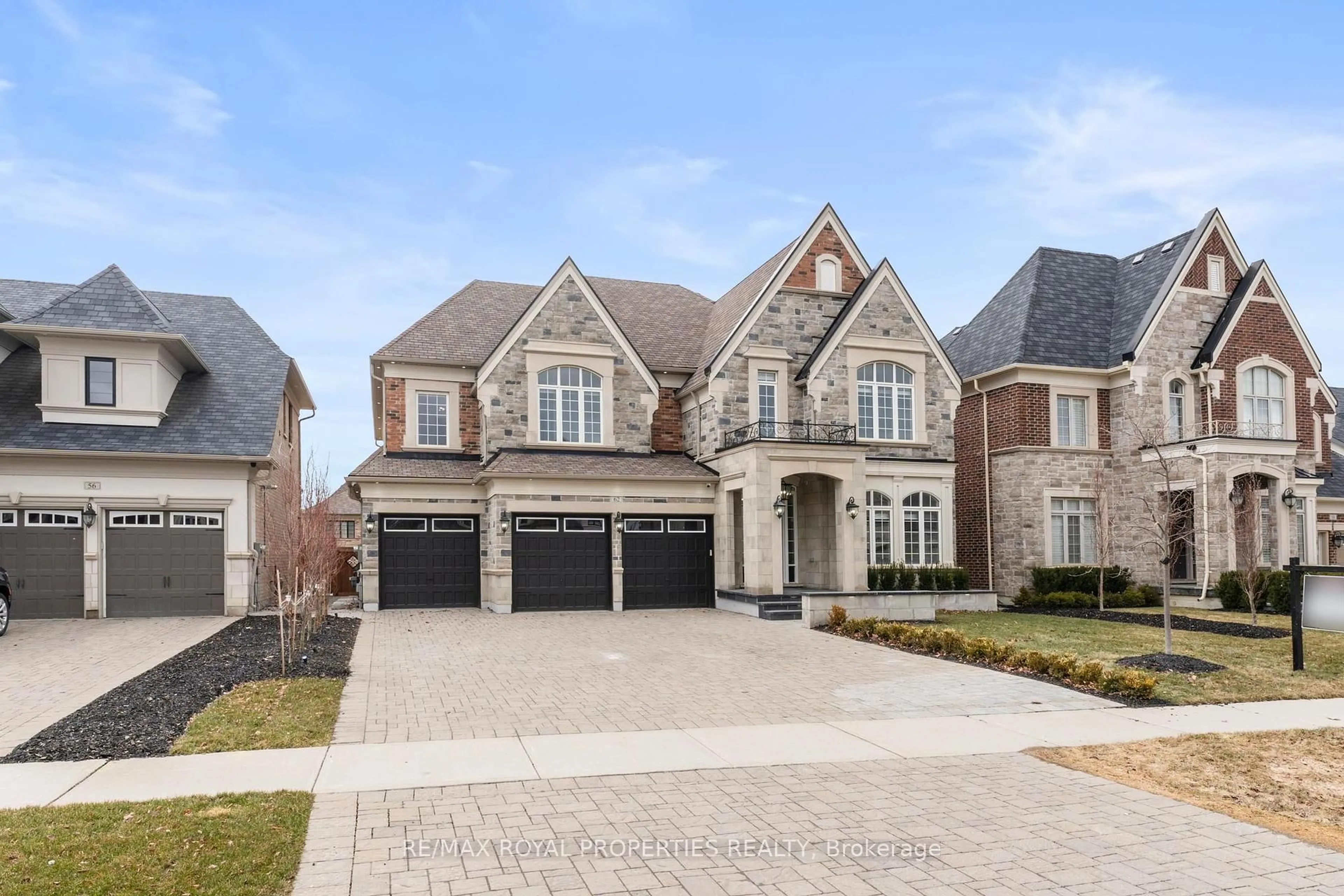 Home with brick exterior material, street for 62 Endless Circ, Vaughan Ontario L4H 4N6