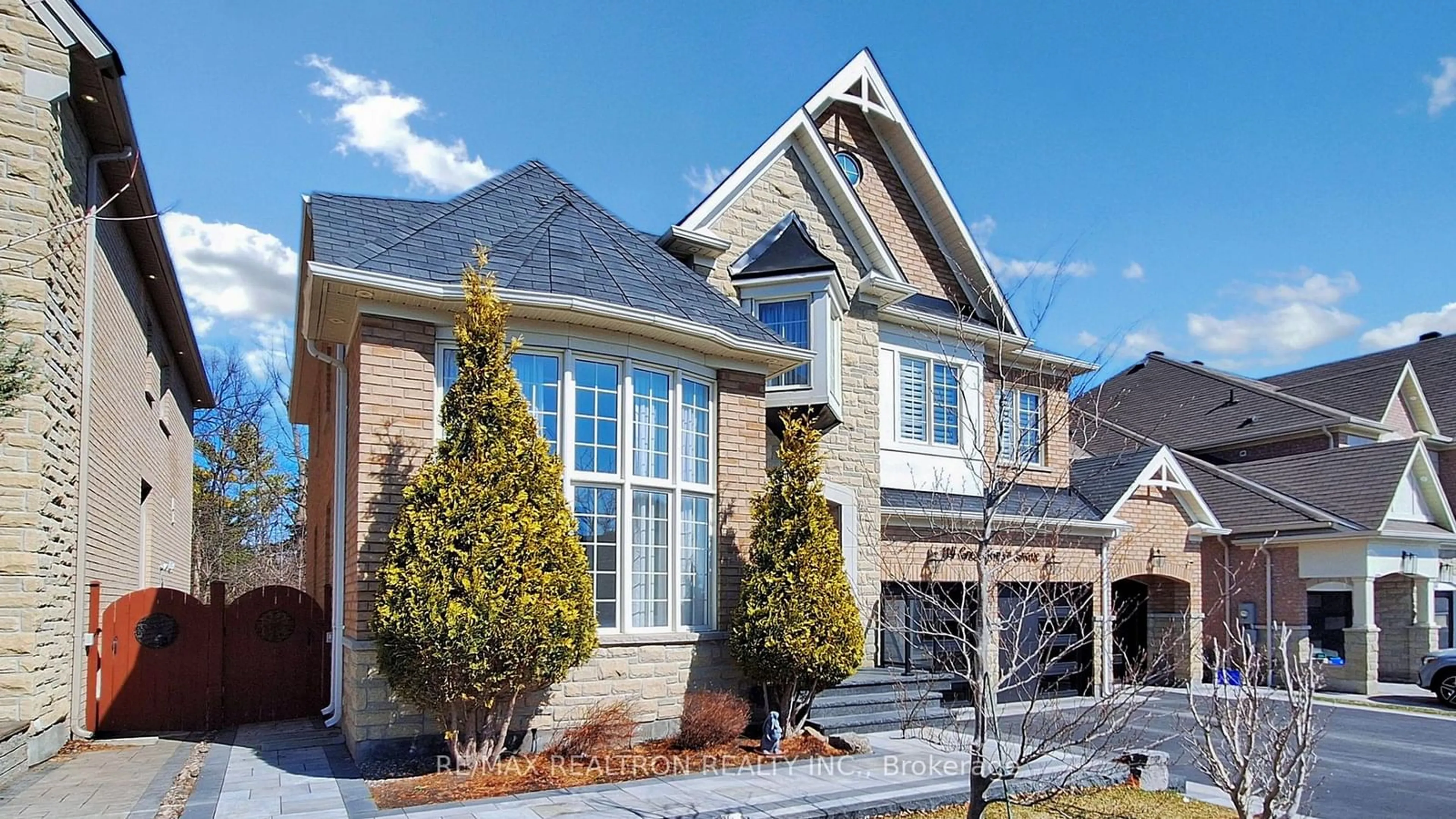 Home with brick exterior material, street for 114 Greenforest Grve, Whitchurch-Stouffville Ontario L4A 1S7