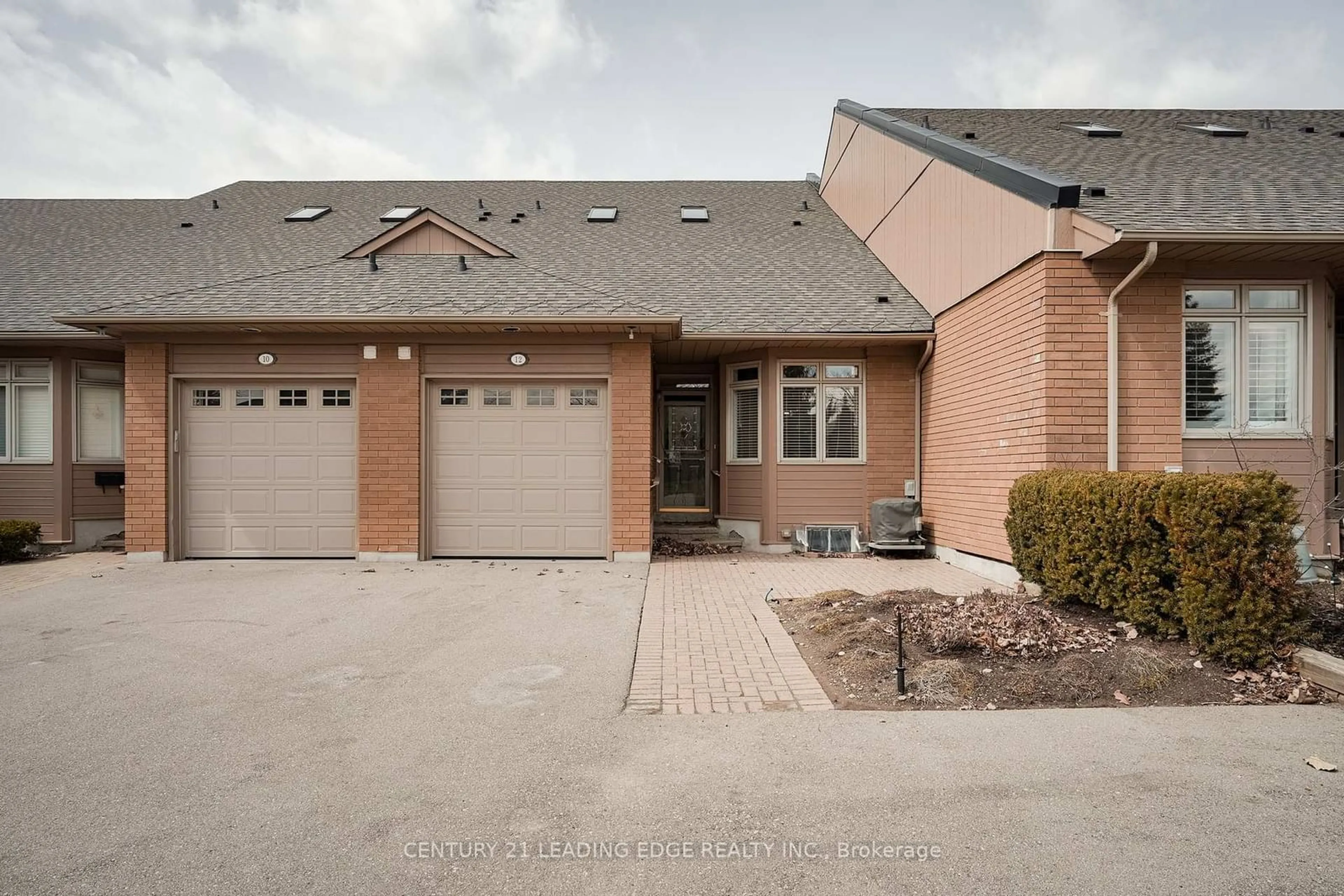Home with brick exterior material, street for 12 Lakeside Vista Way, Markham Ontario L6E 1J2