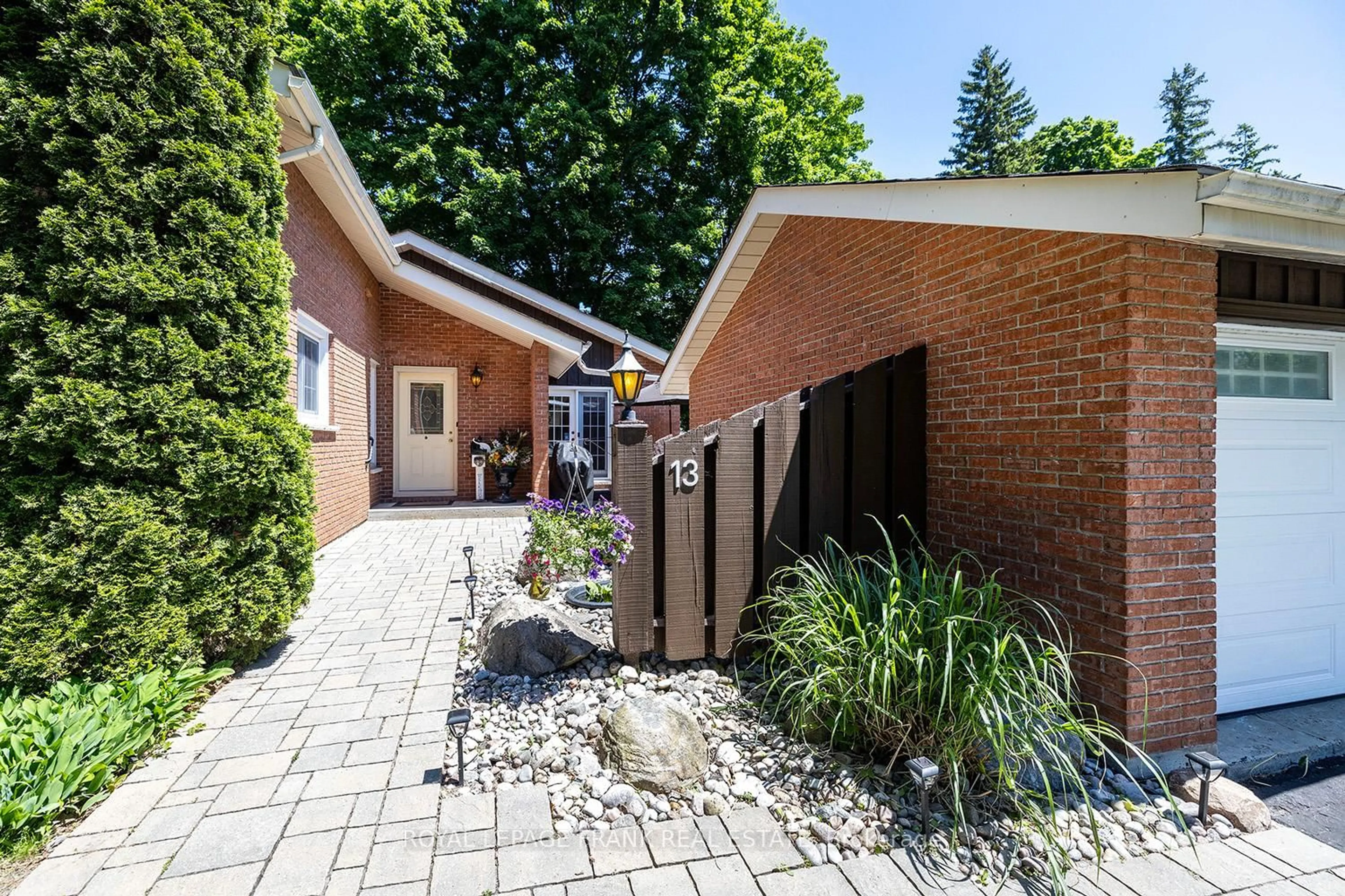 Home with brick exterior material, street for 13 Country Lane, Brock Ontario L0E 1E0