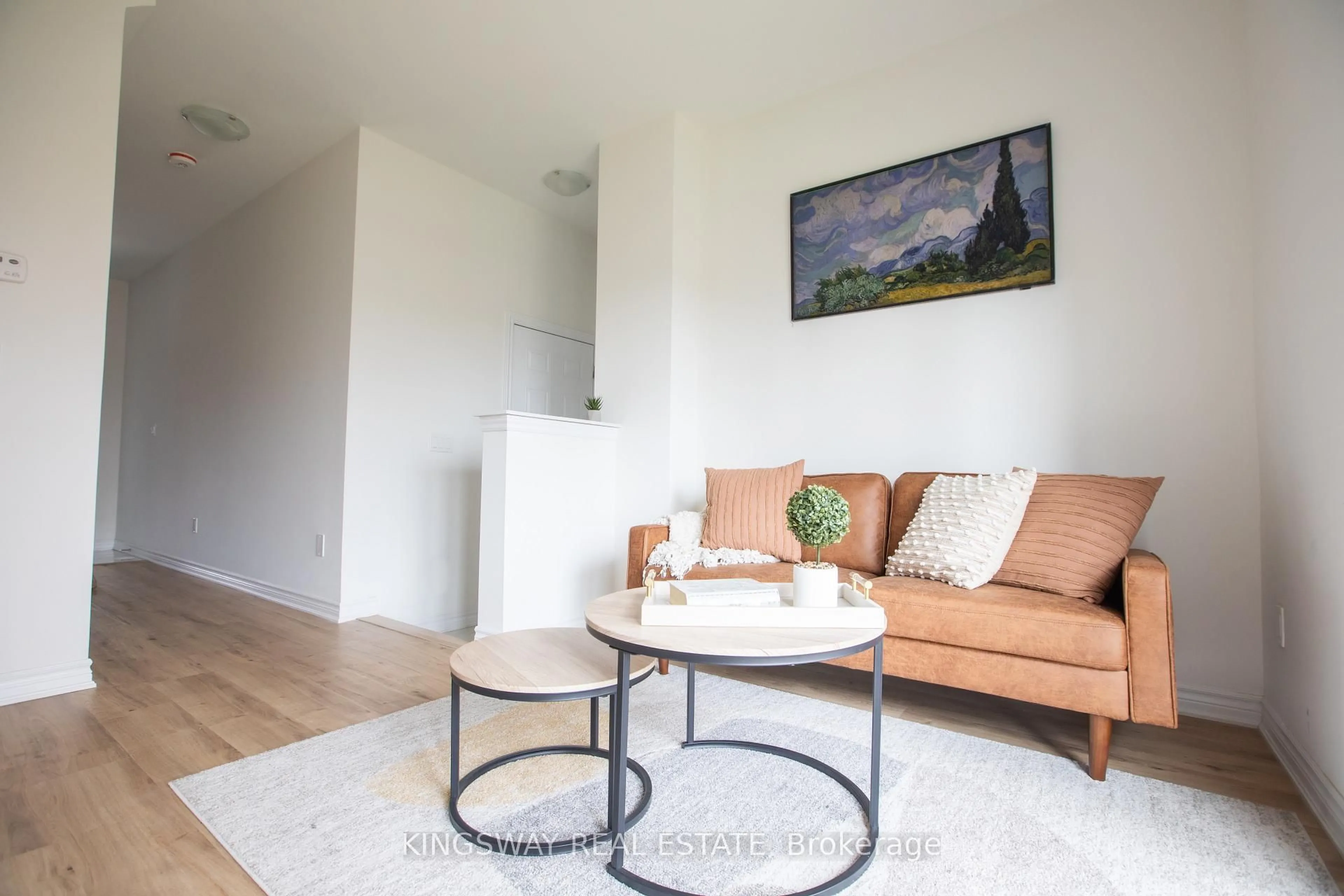 Living room with furniture, wood/laminate floor for 27 Paradox St, Vaughan Ontario L4L 1A7