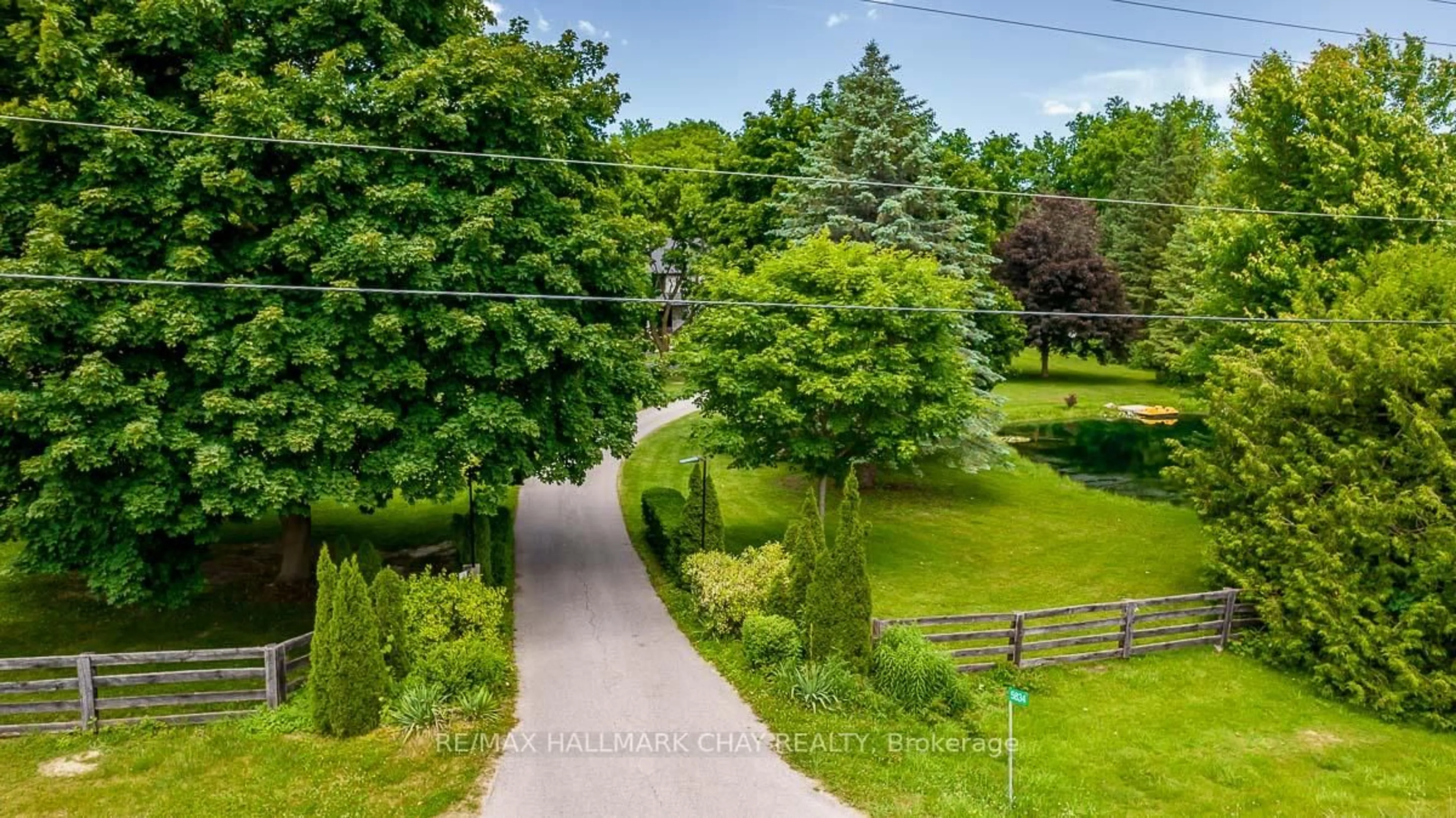 A pic from outside/outdoor area/front of a property/back of a property/a pic from drone, street for 5834 2nd Line, New Tecumseth Ontario L0G 1T0