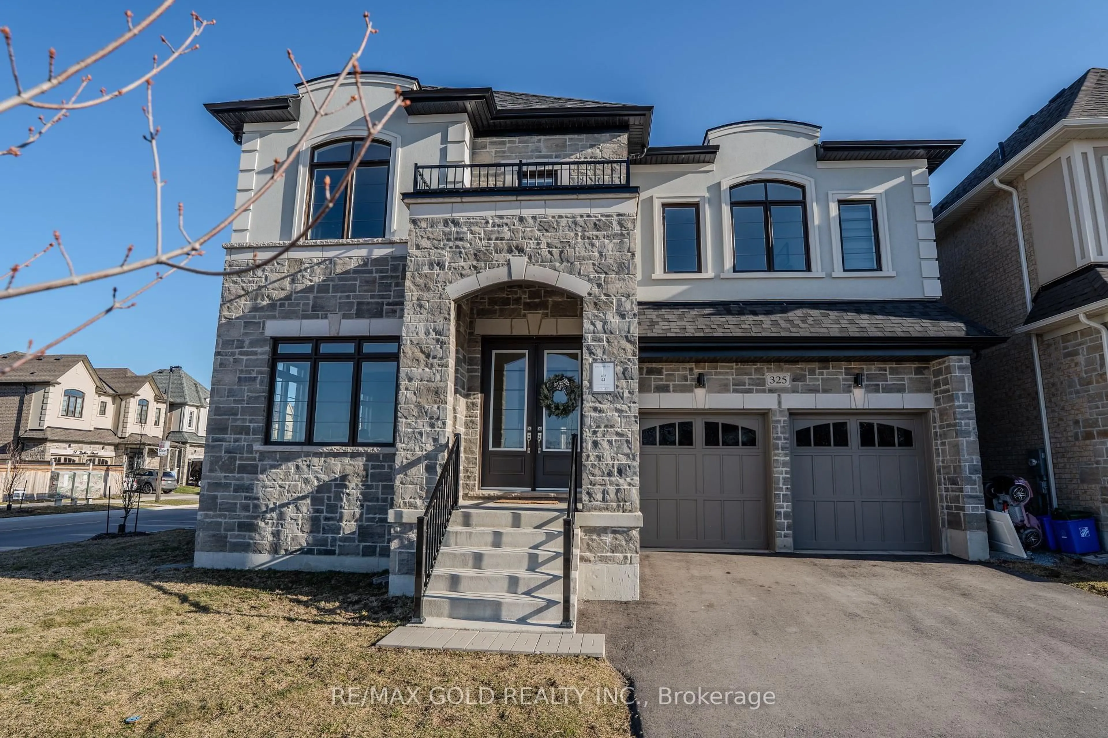 Home with brick exterior material, street for 325 Danny Wheeler Blvd, Georgina Ontario L4P 0K1