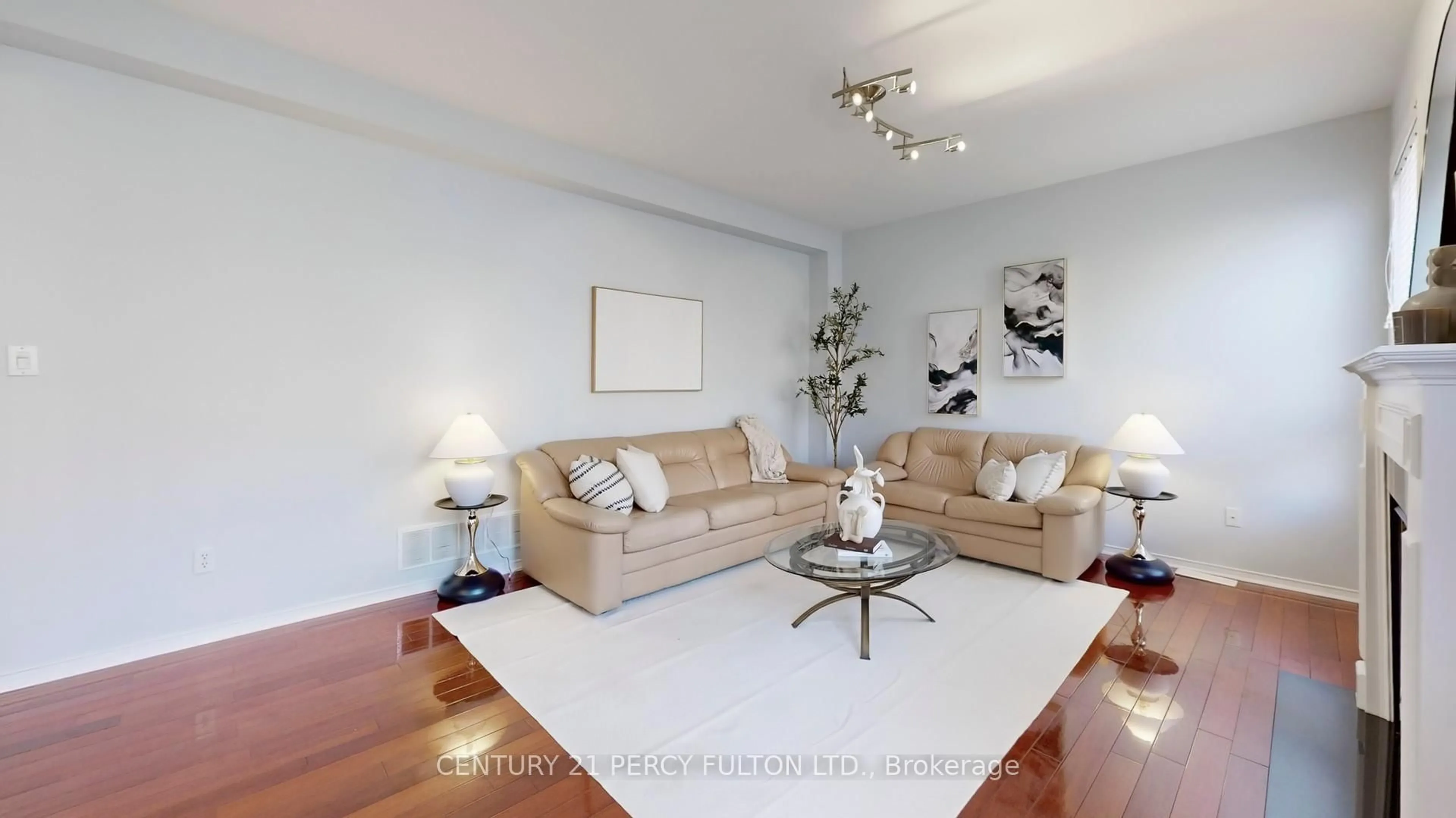 Living room with furniture, wood/laminate floor for 20 Clarry St, Markham Ontario L6E 1E3