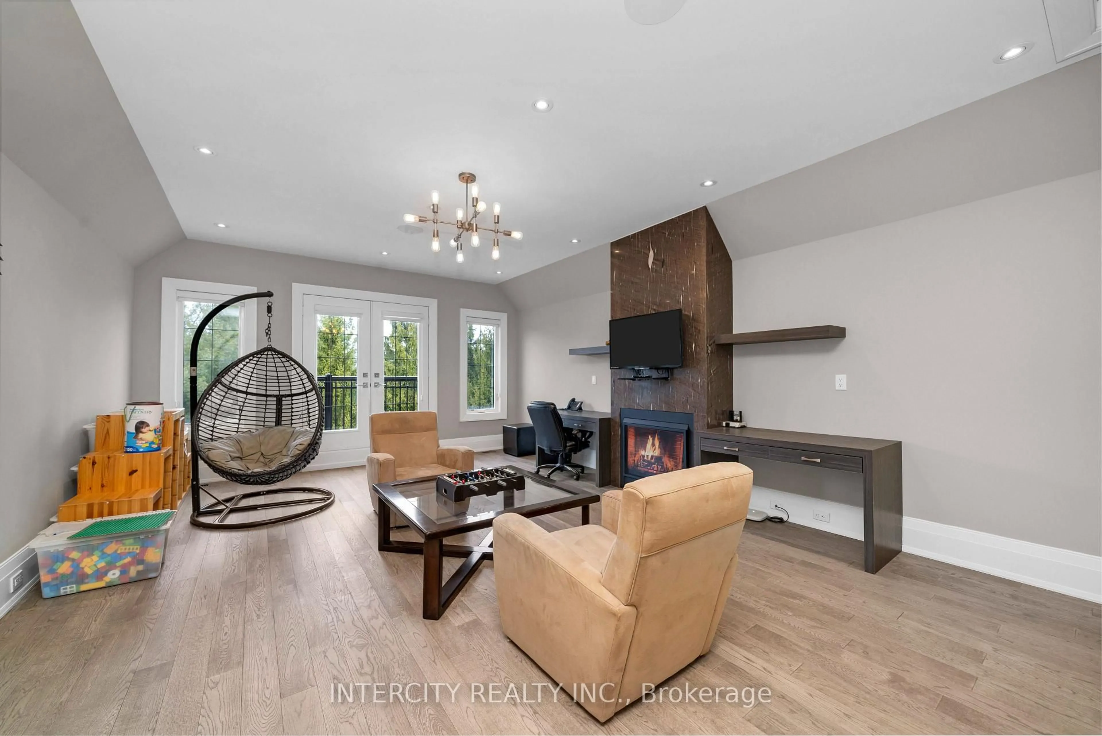 Living room with furniture, wood/laminate floor for 34 Rosebud Crt, Vaughan Ontario L0J 1C0