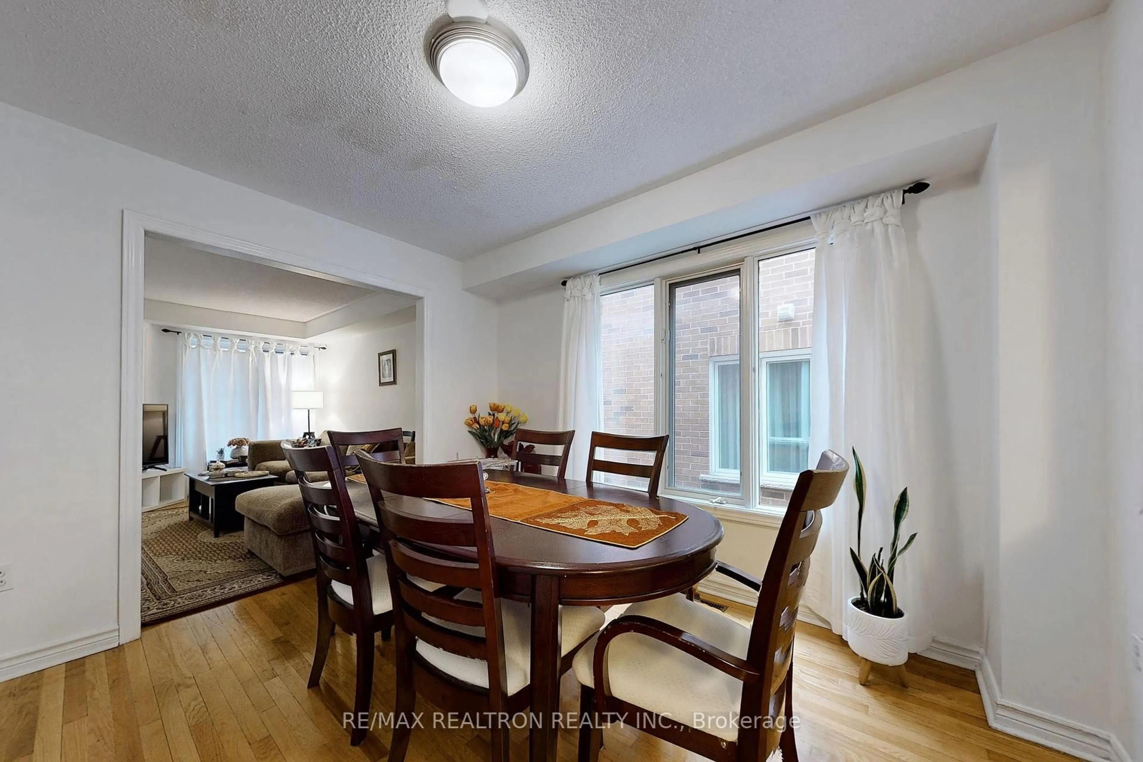 Dining room, wood/laminate floor for 99 Widdifield Ave, Newmarket Ontario L3X 1Z3