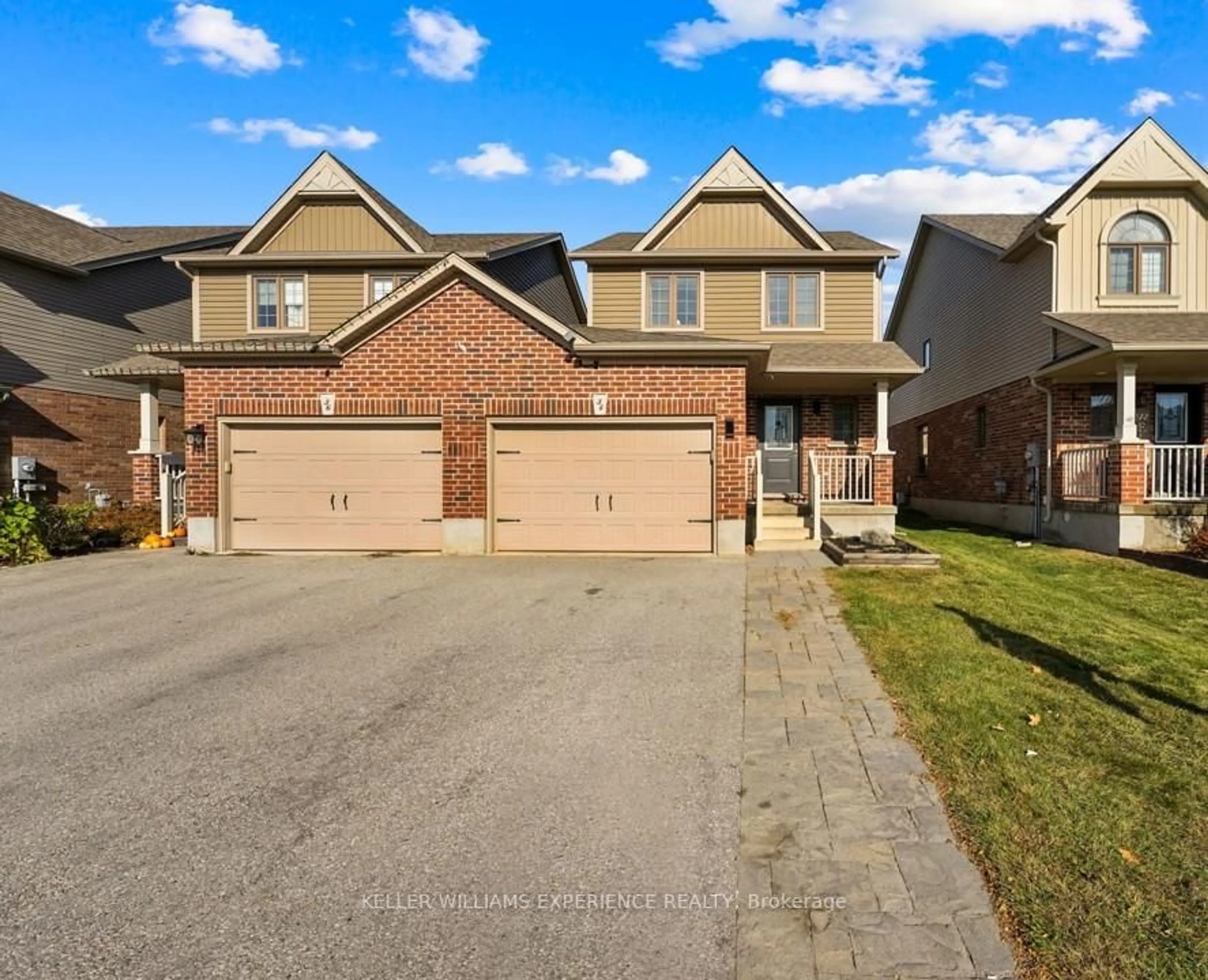 A pic from outside/outdoor area/front of a property/back of a property/a pic from drone, street for 34 Quigley St, Essa Ontario L0M 1B5