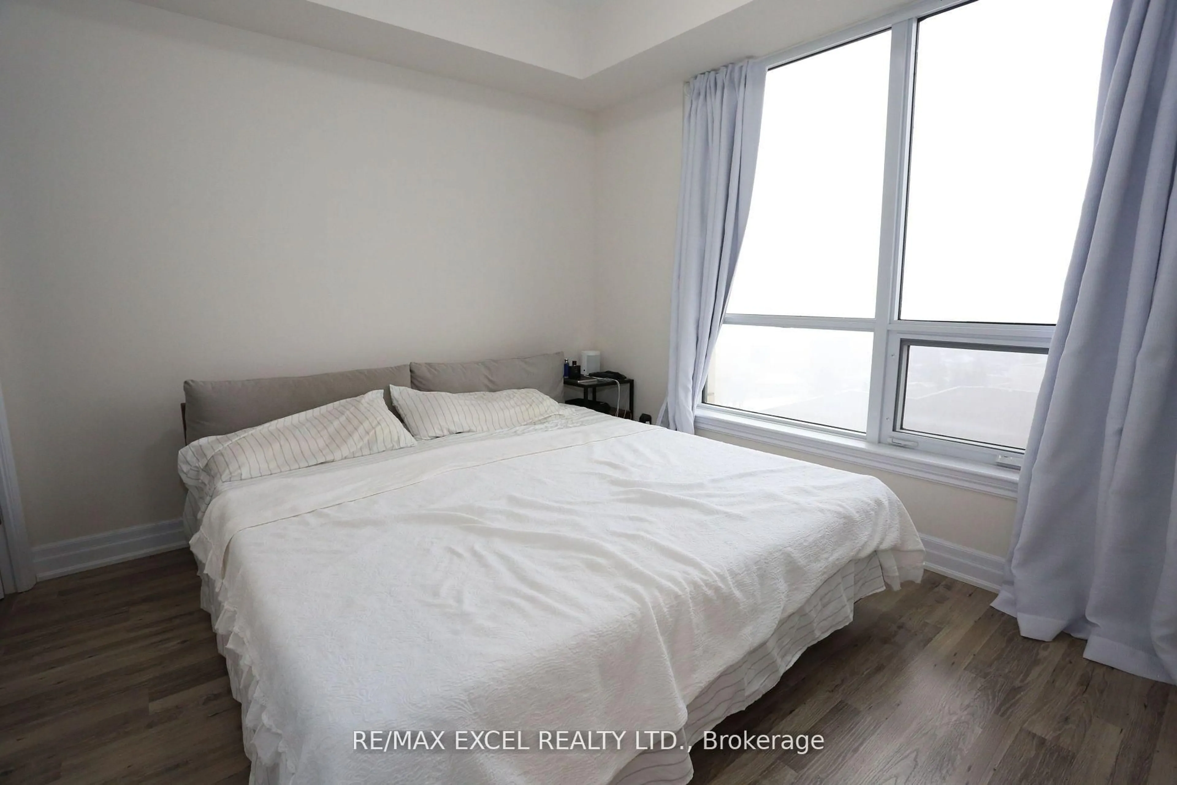 Bedroom with bed, unknown for 9075 Jane St #705, Vaughan Ontario L5K 0L7