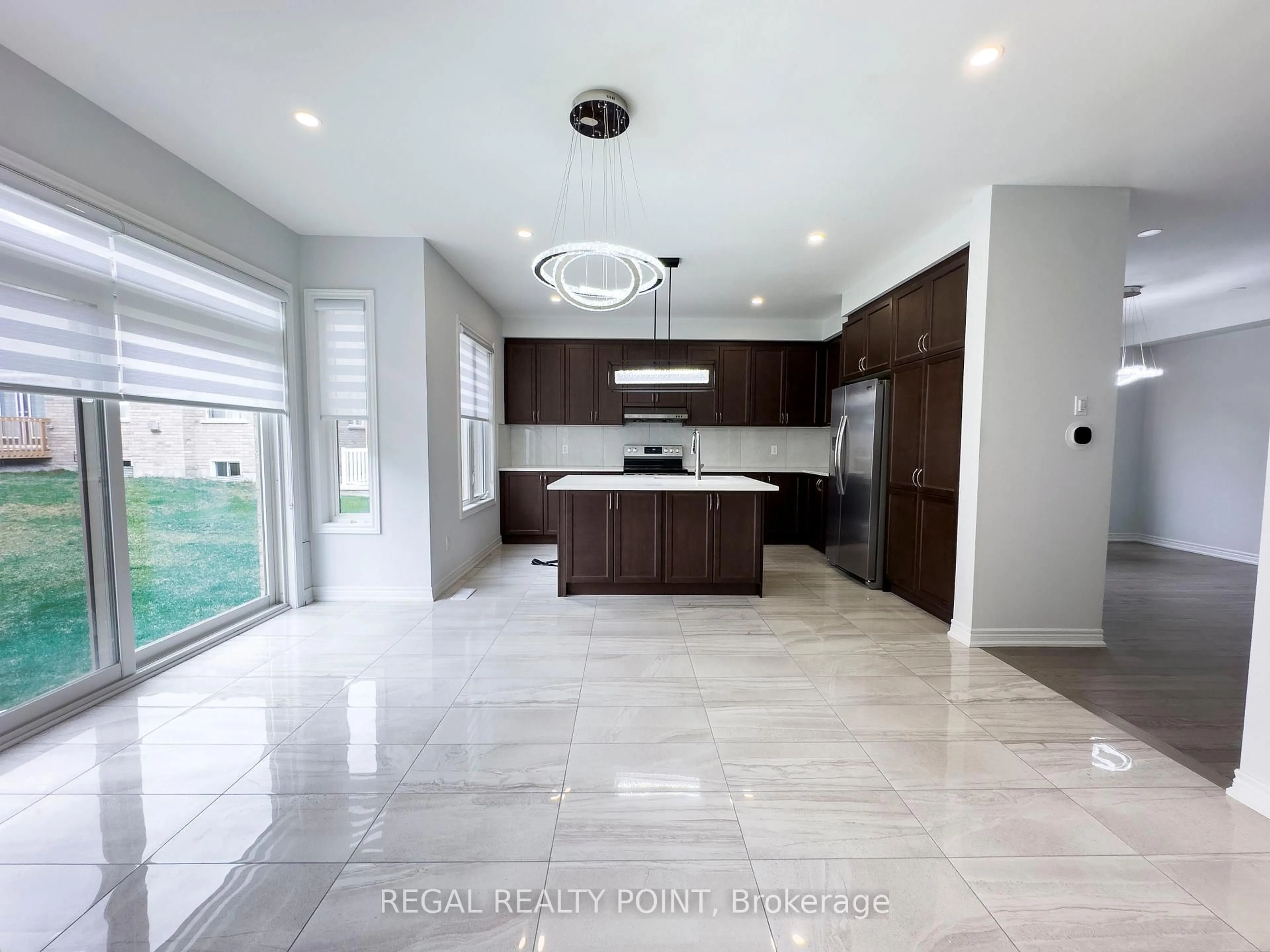 Open concept kitchen, ceramic/tile floor for 3 Father Muckle Ave, Georgina Ontario L4P 0E8