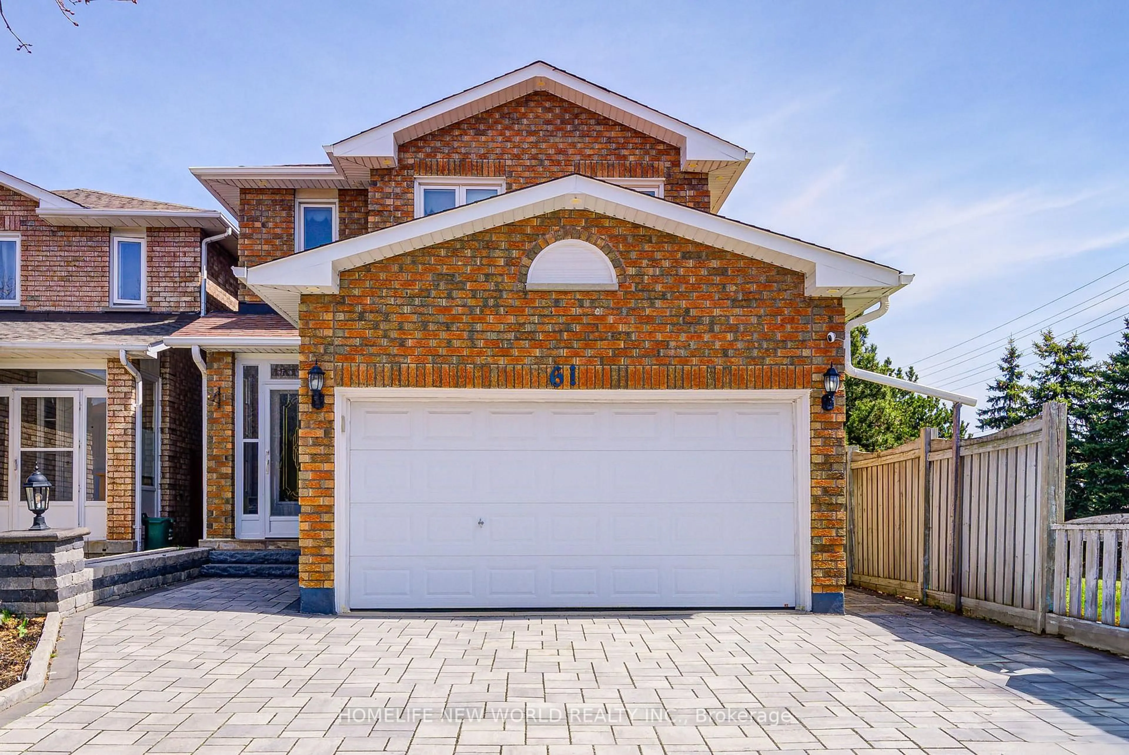 Home with brick exterior material, street for 61 Olivewood Dr, Markham Ontario L3S 3E2