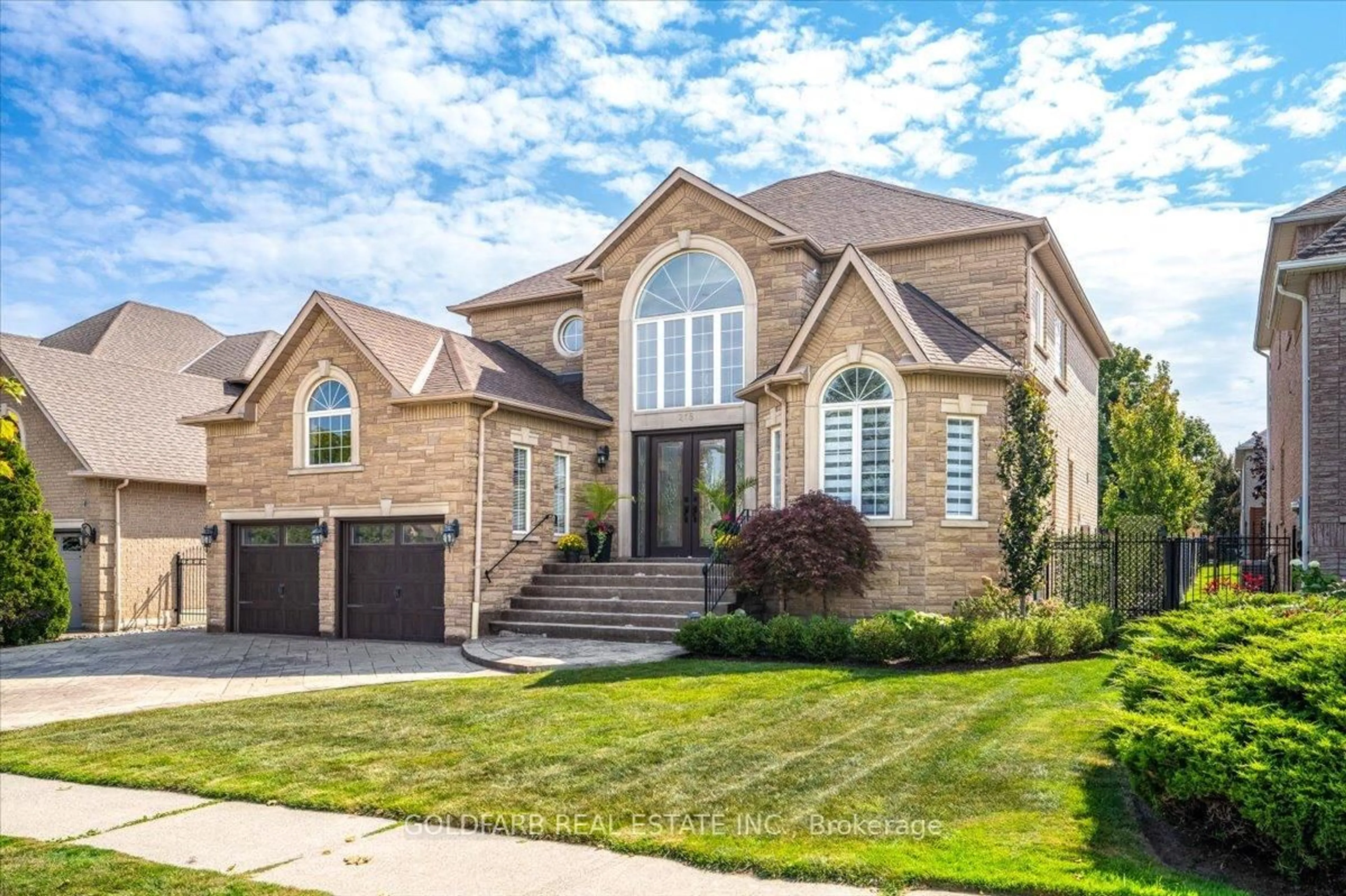 Home with brick exterior material, street for 215 Thomson Creek Blvd, Vaughan Ontario L4H 1H1