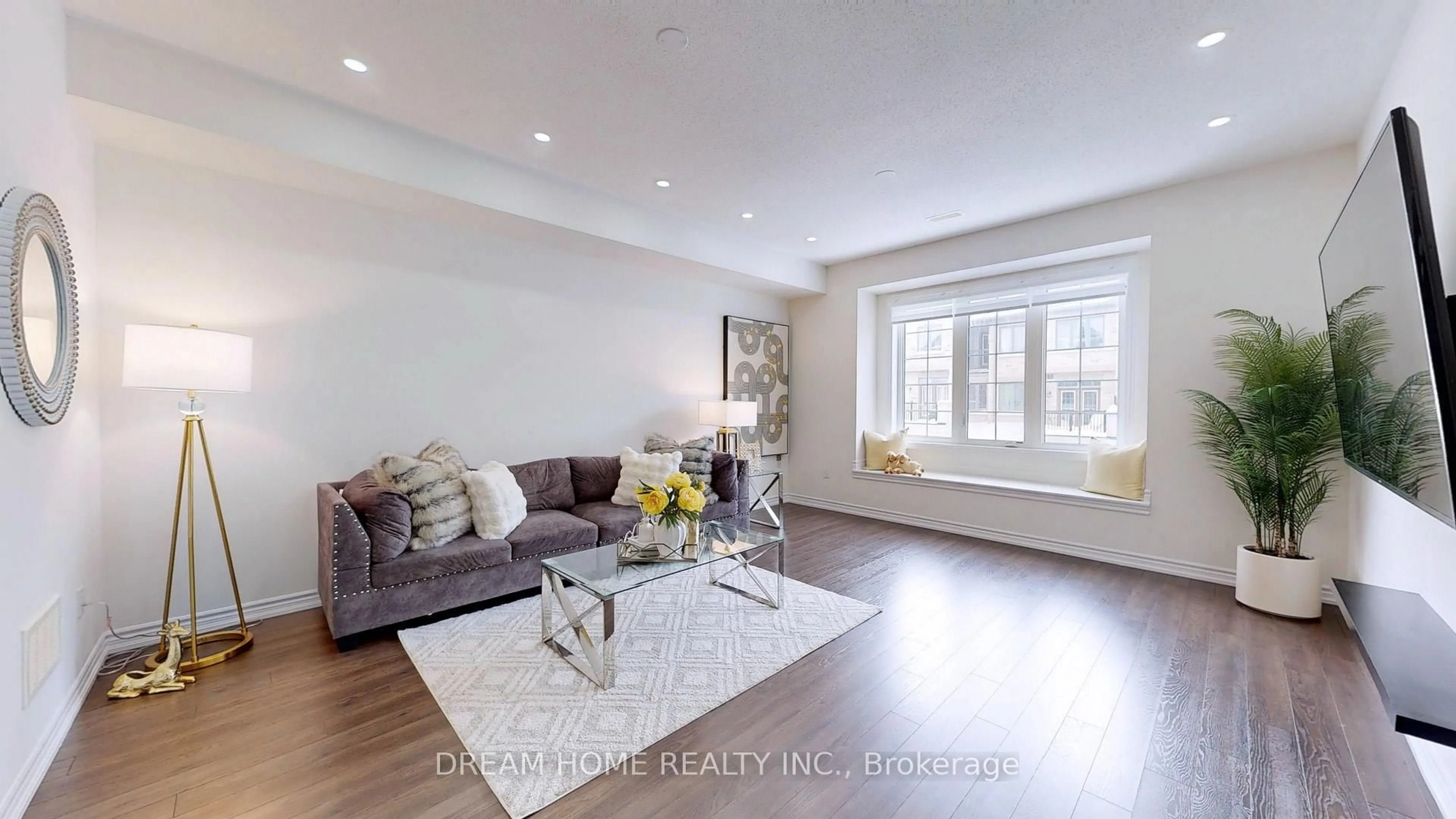 Living room with furniture, wood/laminate floor for 134 Frederick Wilson Ave, Markham Ontario L6B 0R1