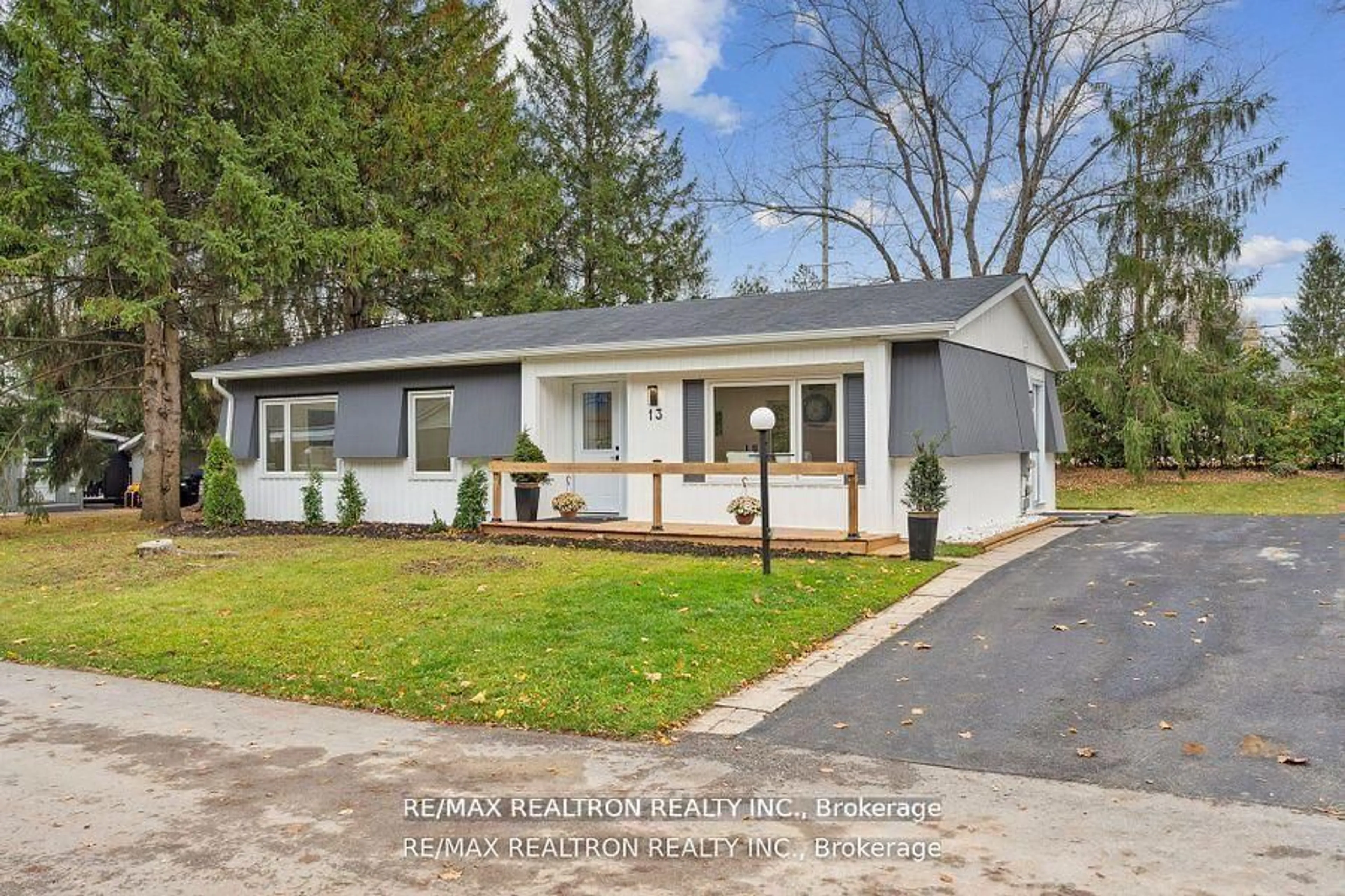 Home with vinyl exterior material, street for 13 Cherrywood Lane, Innisfil Ontario L9S 1M9