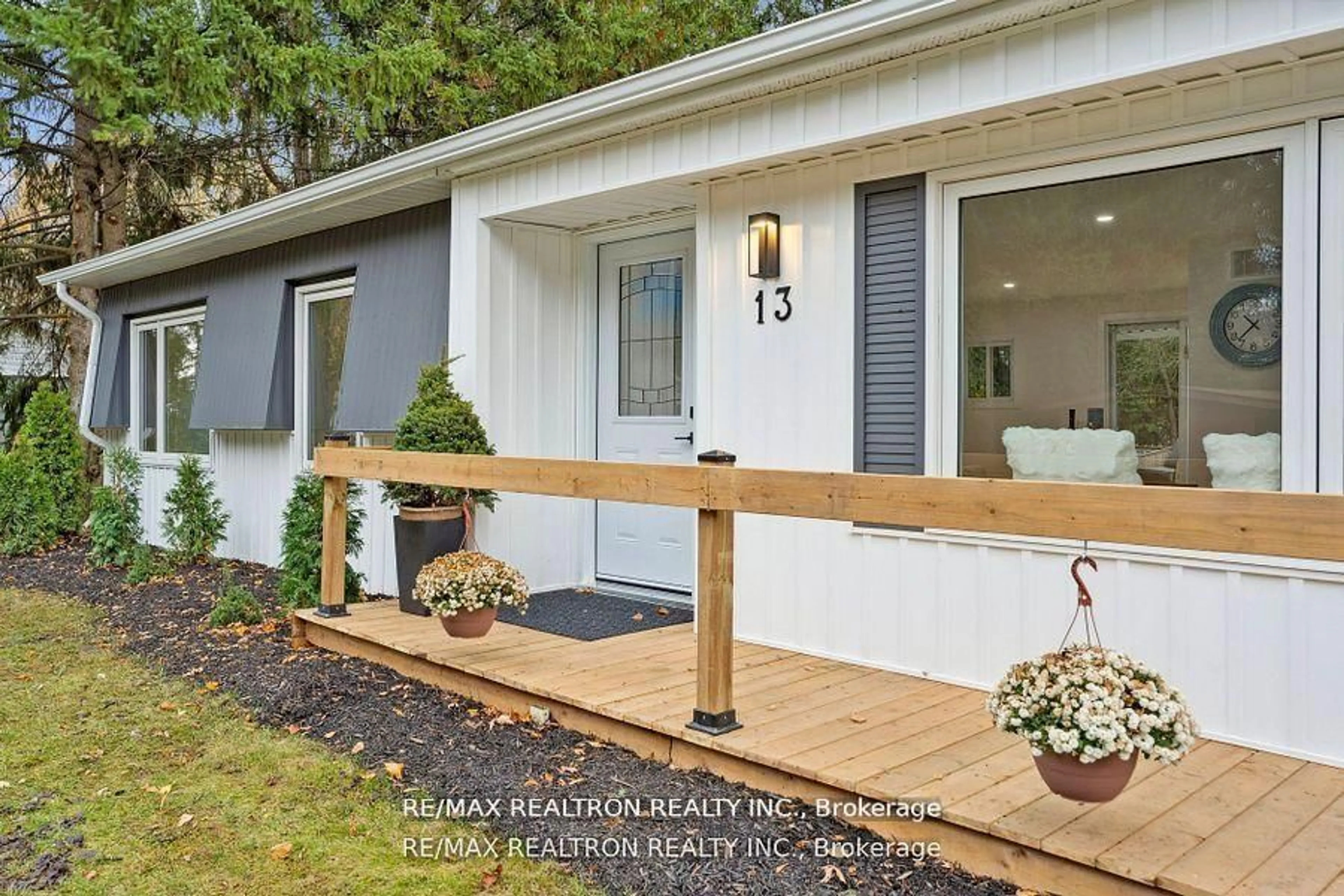 Home with vinyl exterior material, street for 13 Cherrywood Lane, Innisfil Ontario L9S 1M9