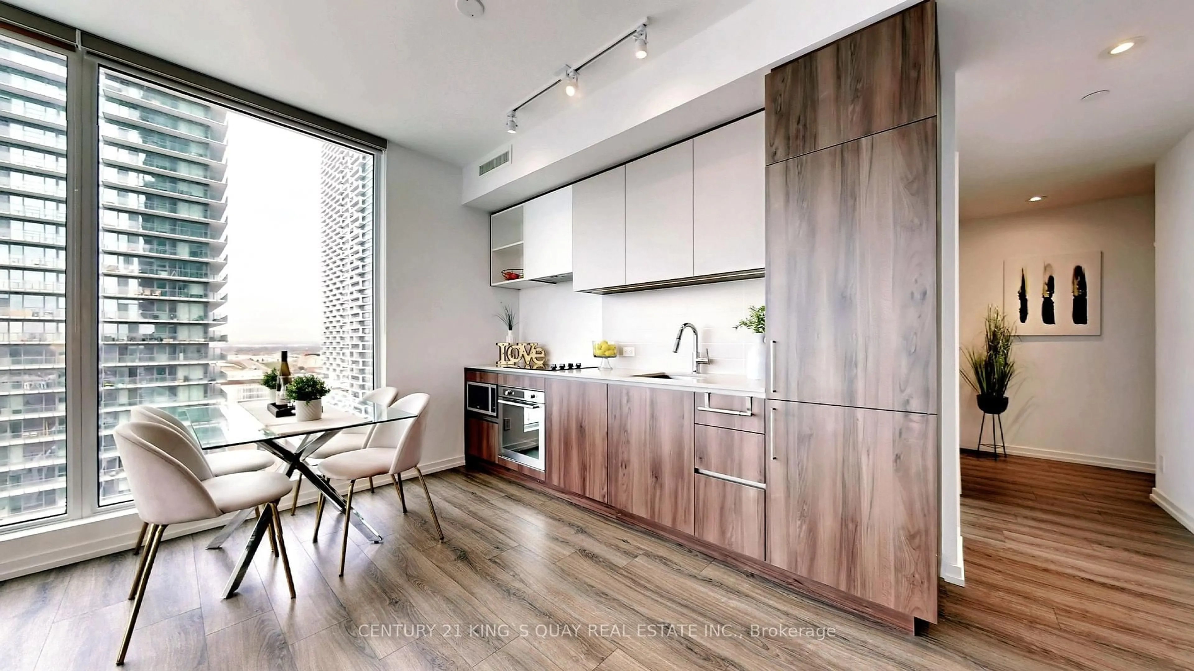 Open concept kitchen, wood/laminate floor for 7890 Jane St #1602, Vaughan Ontario L4K 0K9