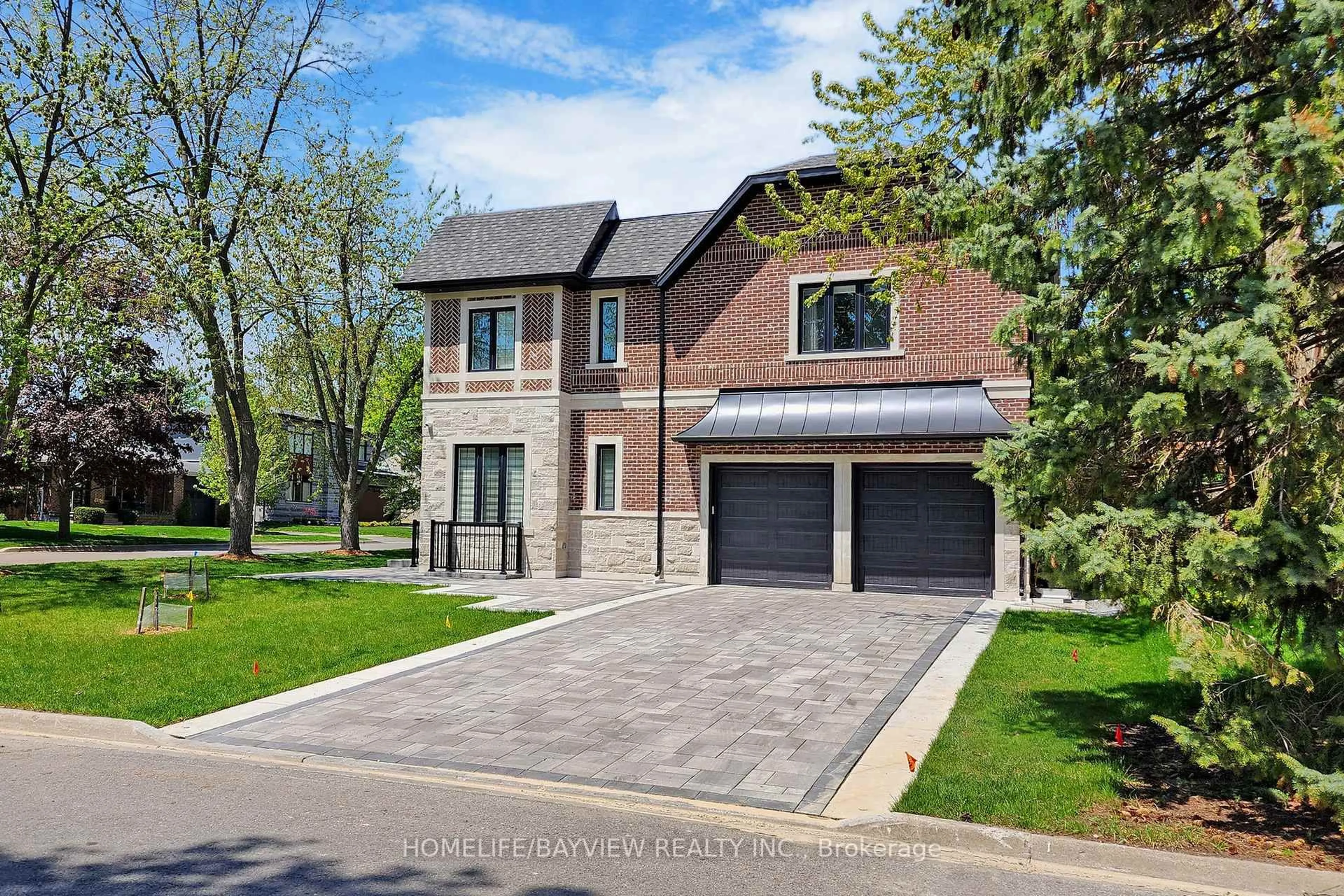 Home with brick exterior material, street for 133 Bay Thorn Dr, Markham Ontario L3T 3V1