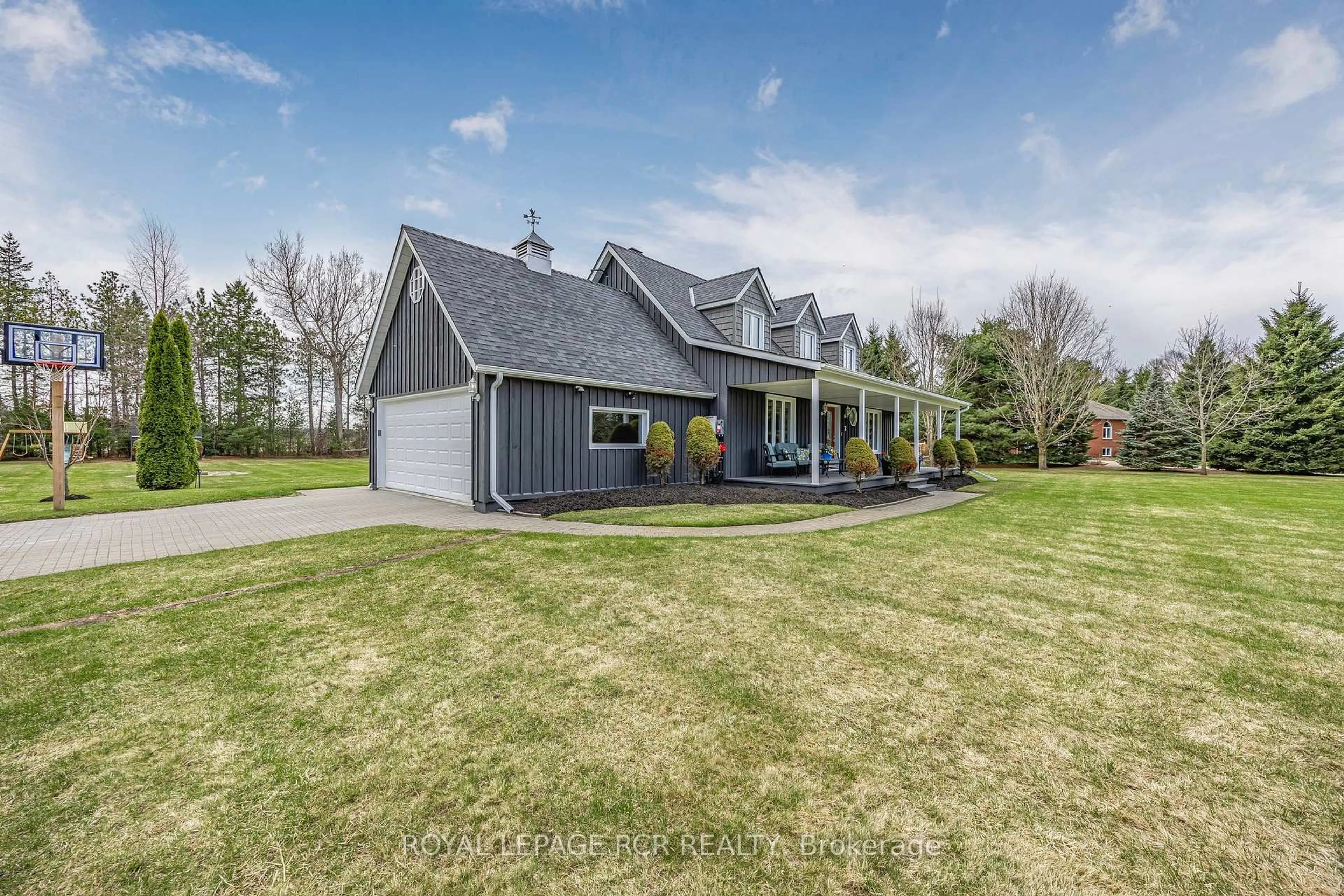 Home with vinyl exterior material, street for 2 Tioga Blvd, Adjala-Tosorontio Ontario L0M 1J0