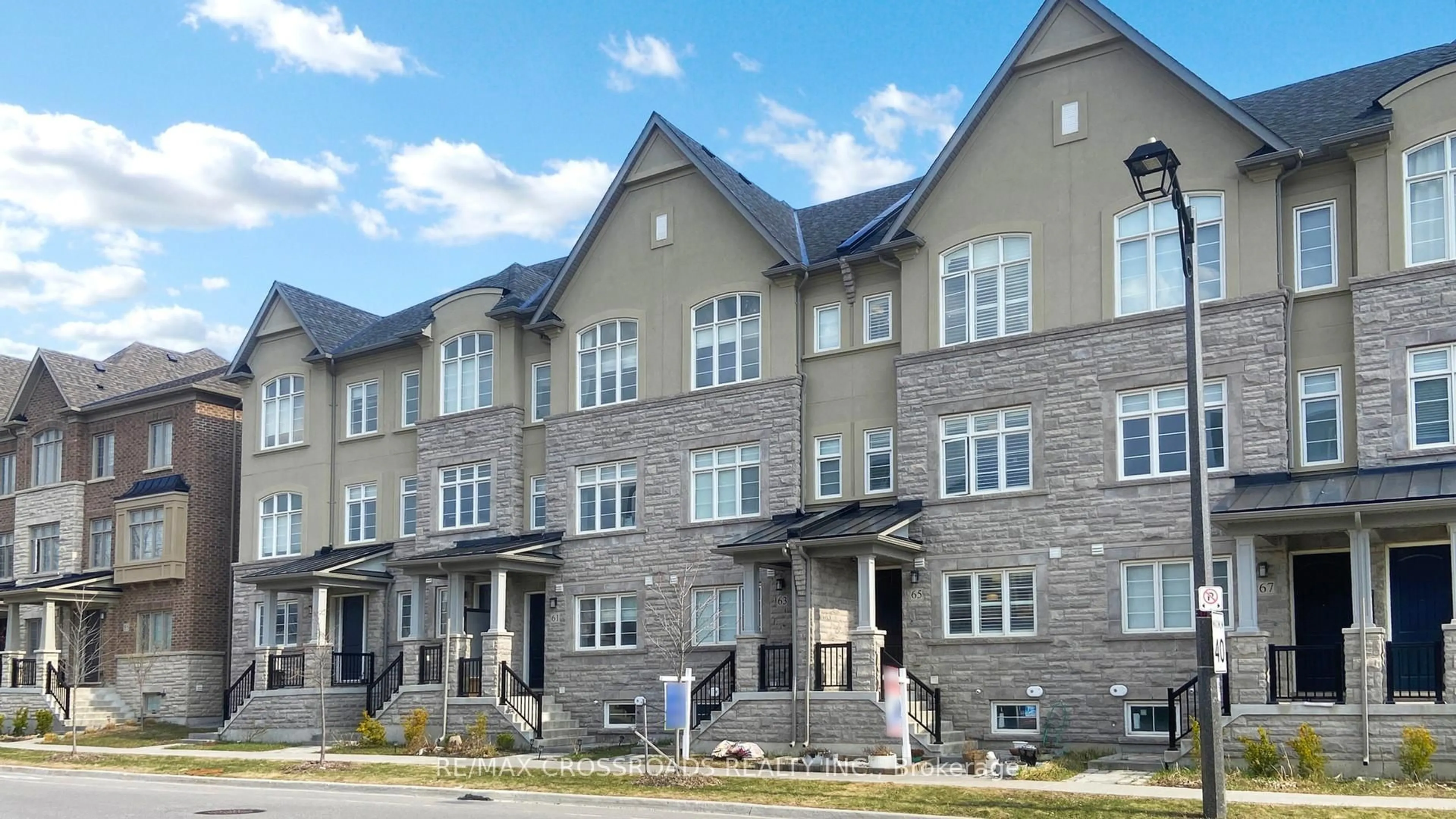 Home with brick exterior material, street for 65 New Yorkton Ave, Markham Ontario L6C 0Y5