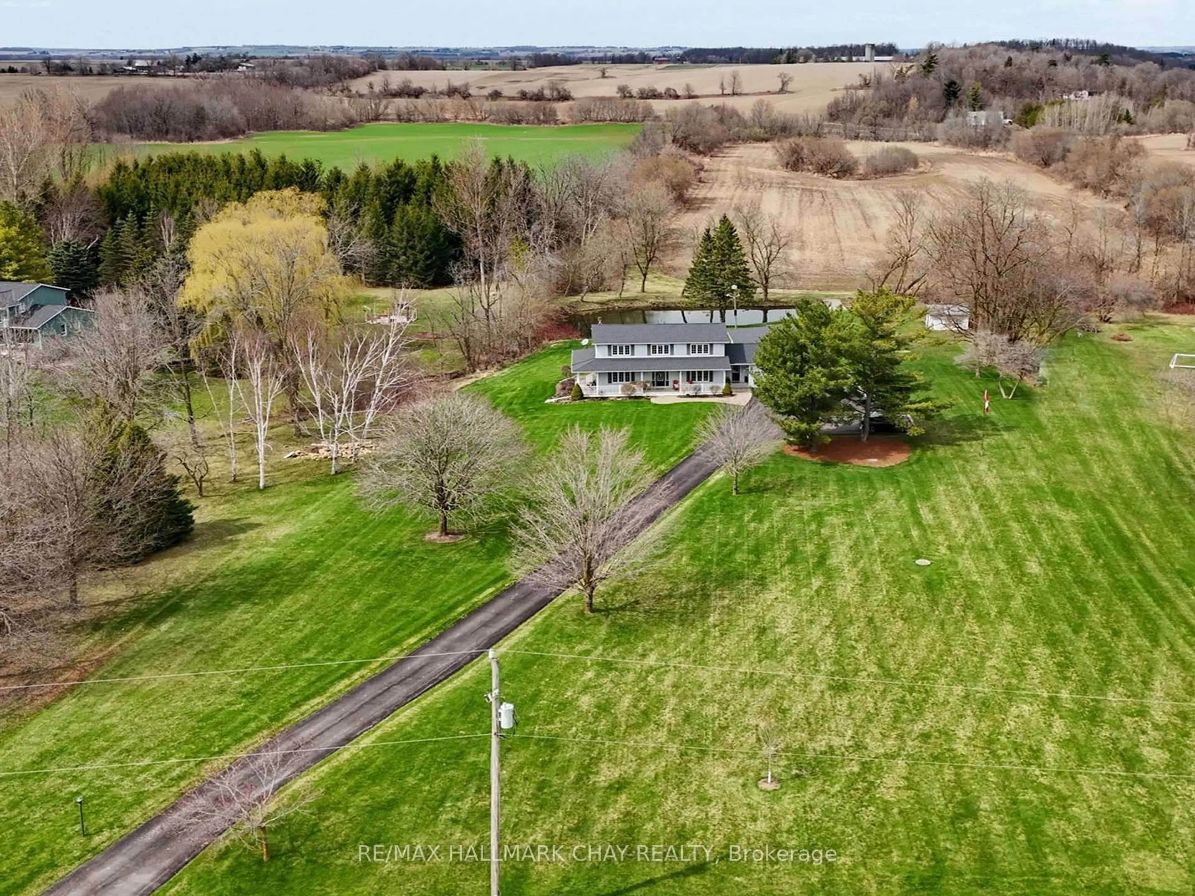 A pic from outside/outdoor area/front of a property/back of a property/a pic from drone, water/lake/river/ocean view for 4880 7th Line, New Tecumseth Ontario L0G 1A0