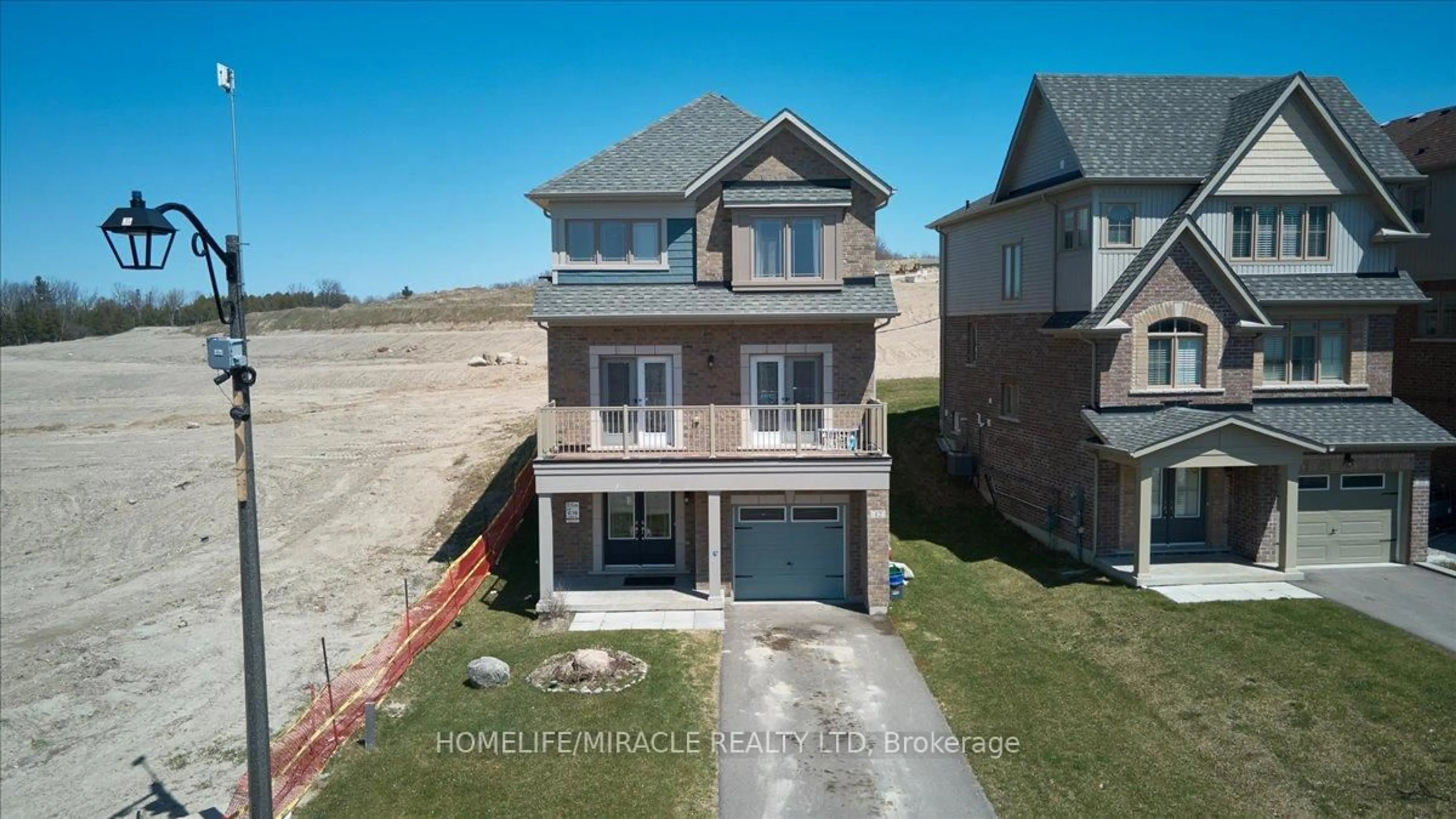 A pic from outside/outdoor area/front of a property/back of a property/a pic from drone, unknown for 12 Janes Cres, New Tecumseth Ontario L9R 0T2