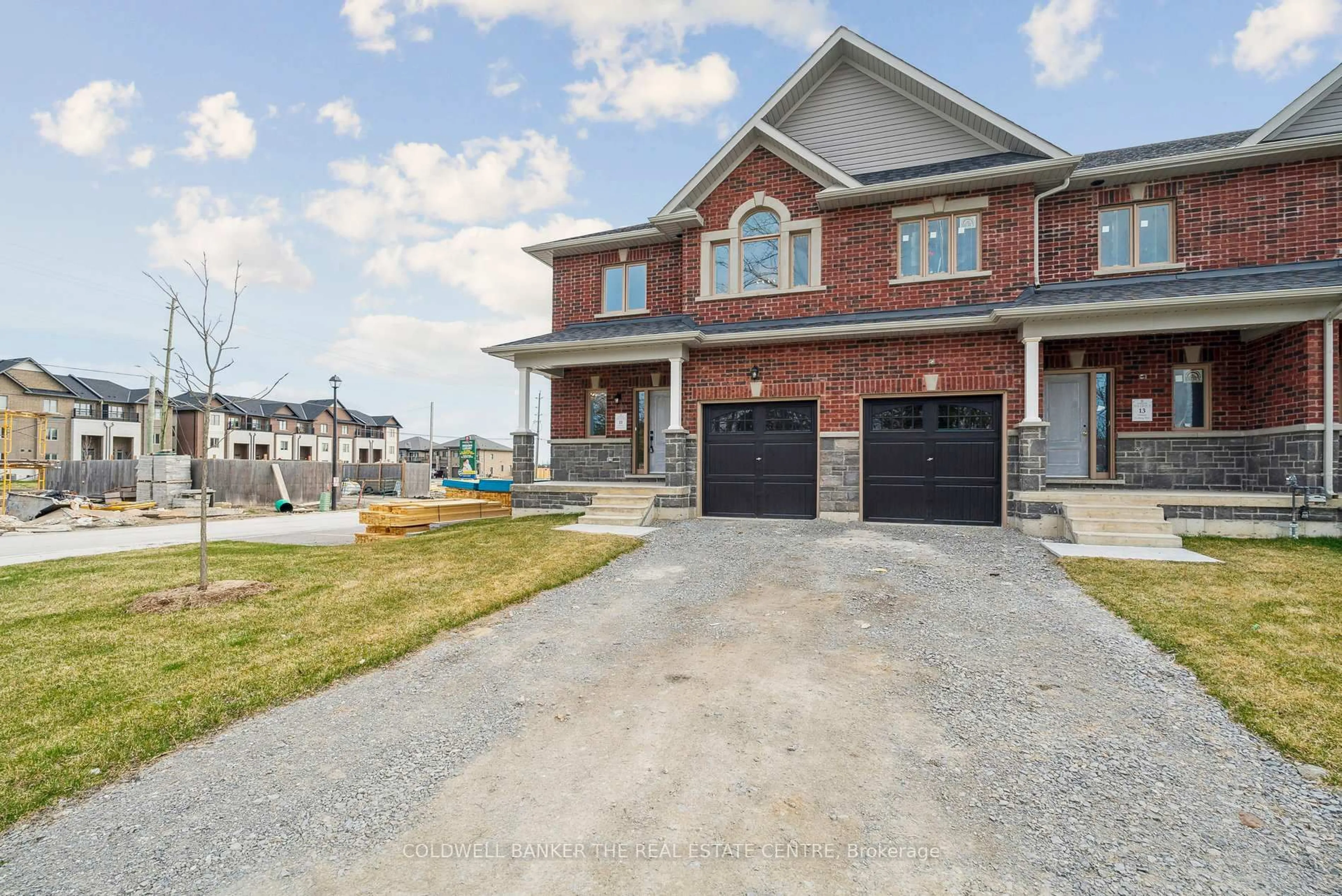 Home with brick exterior material, street for 11 Hildred Cushing Way, Uxbridge Ontario L9P 0S1