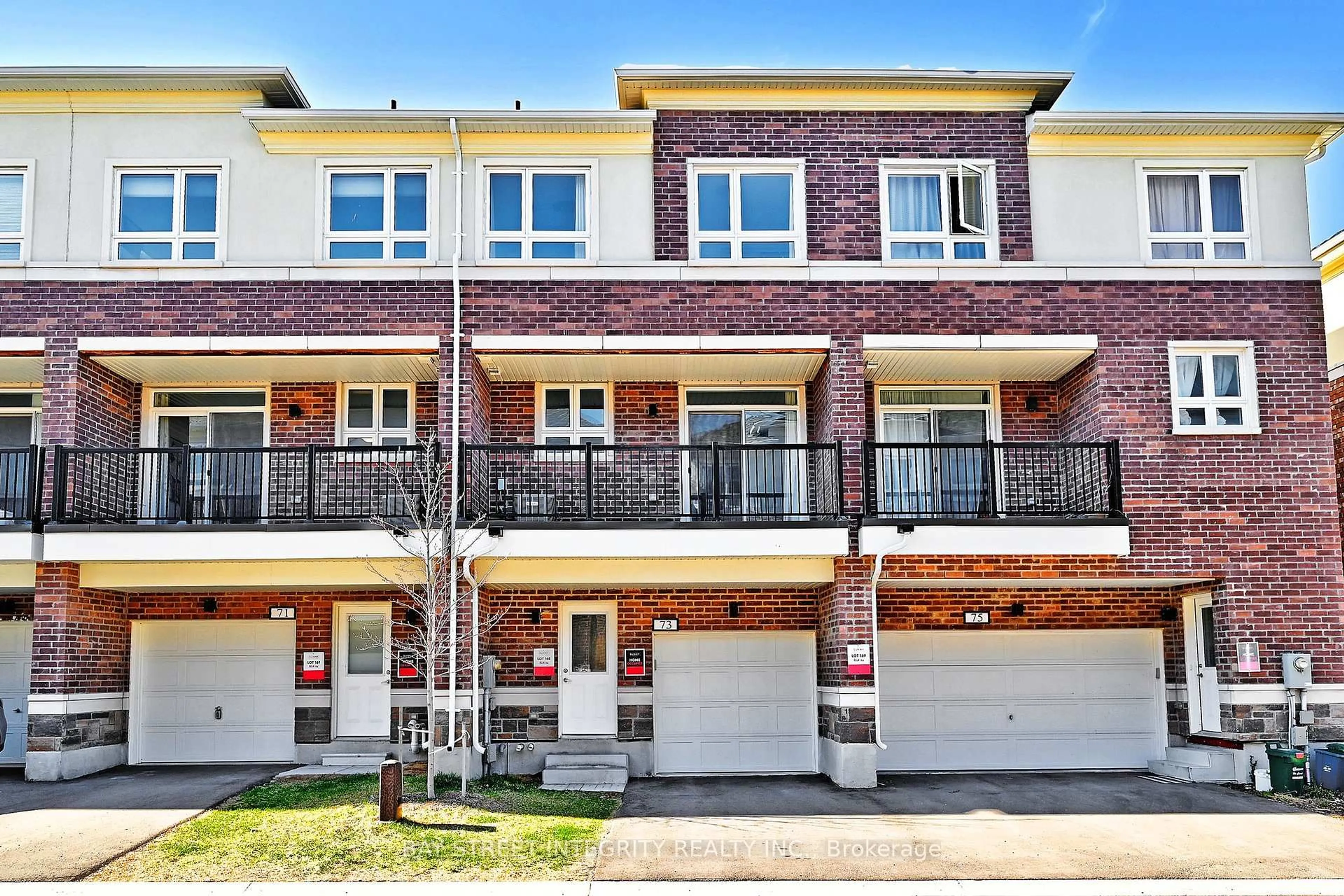 Home with brick exterior material, street for 73 Imperial College Lane, Markham Ontario L6E 0V6