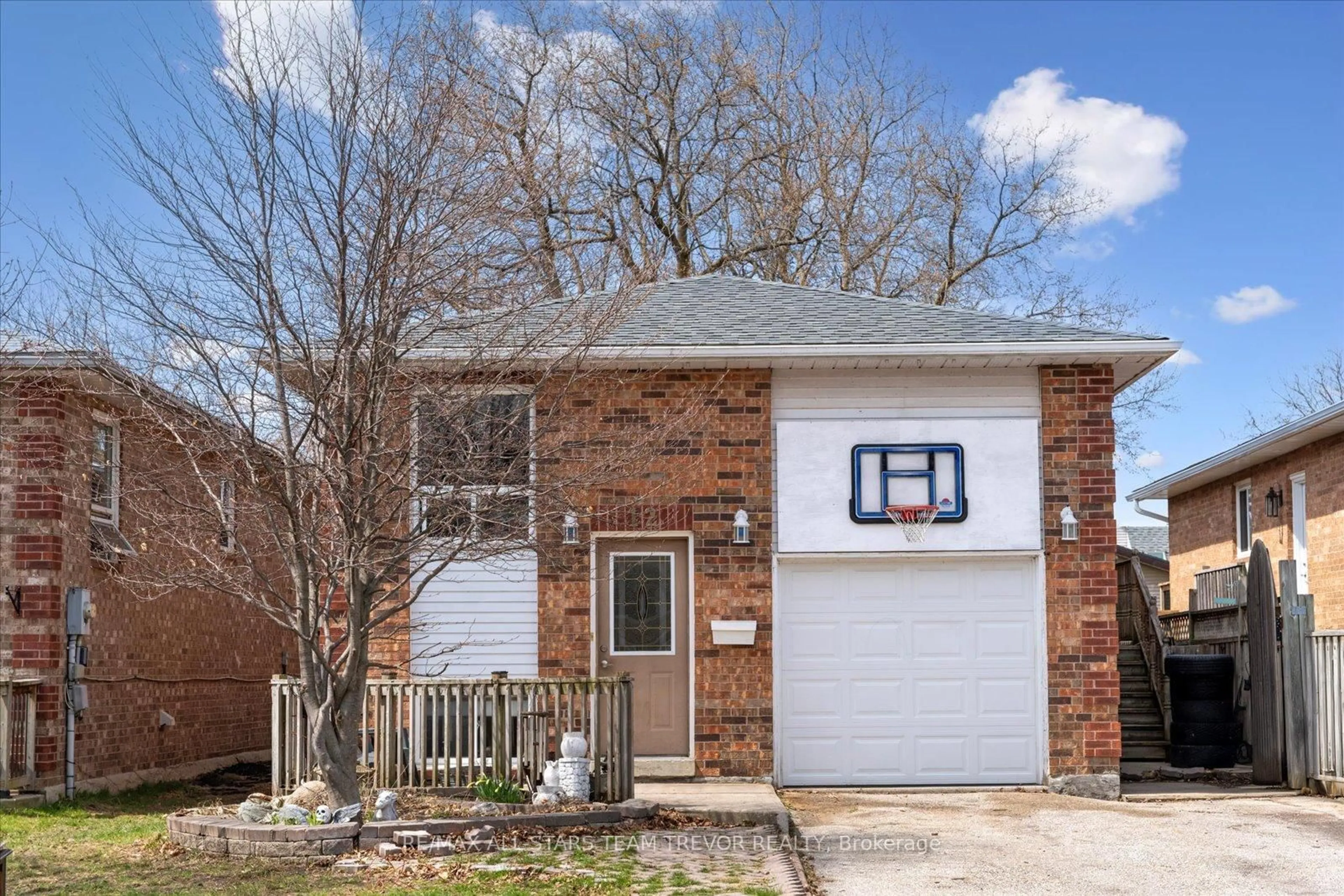 Home with brick exterior material, street for 12 Newlands Ave, Georgina Ontario L4P 3T3