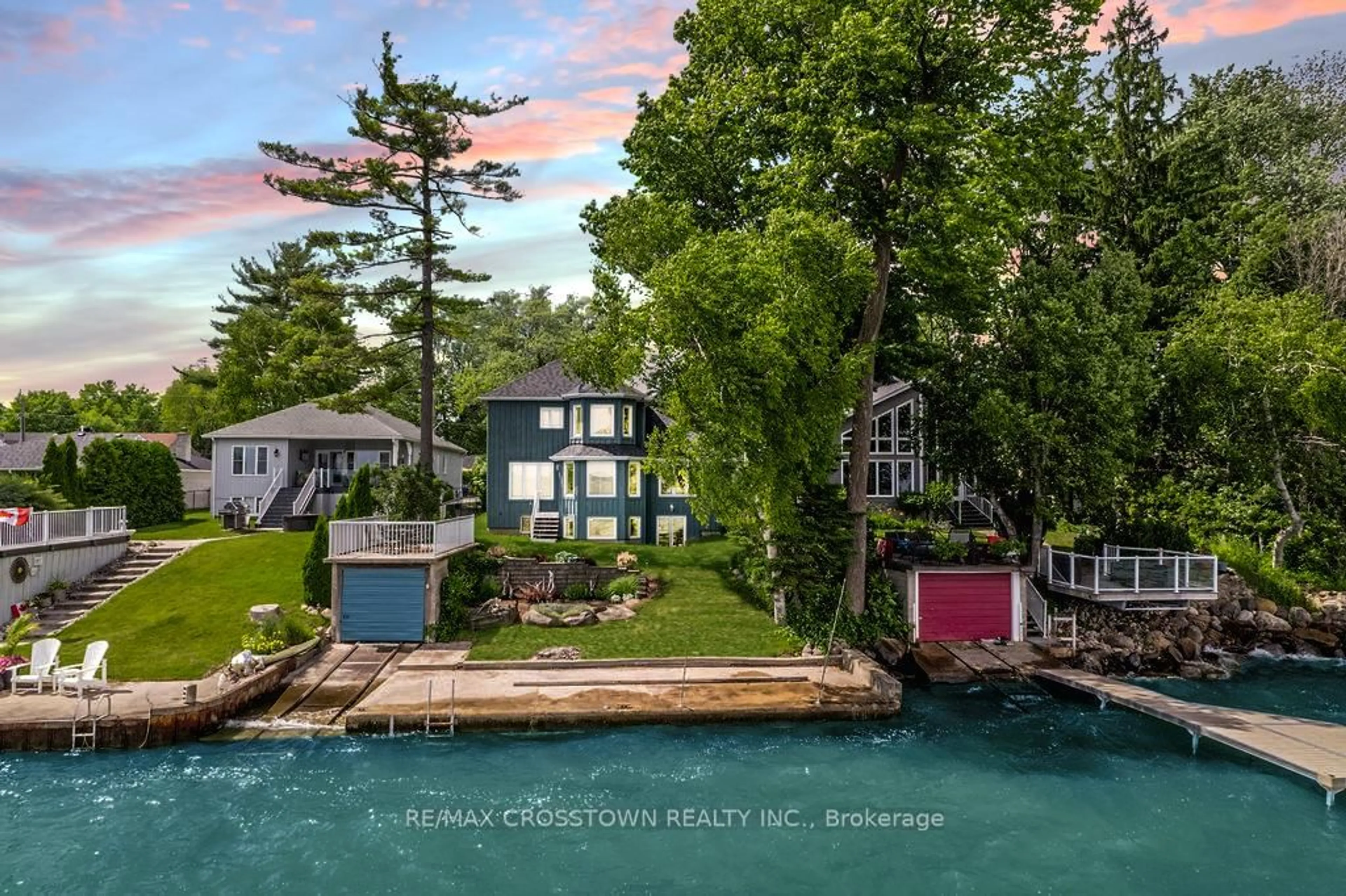 A pic from outside/outdoor area/front of a property/back of a property/a pic from drone, water/lake/river/ocean view for 665 Lakelands Ave, Innisfil Ontario L9S 4E5